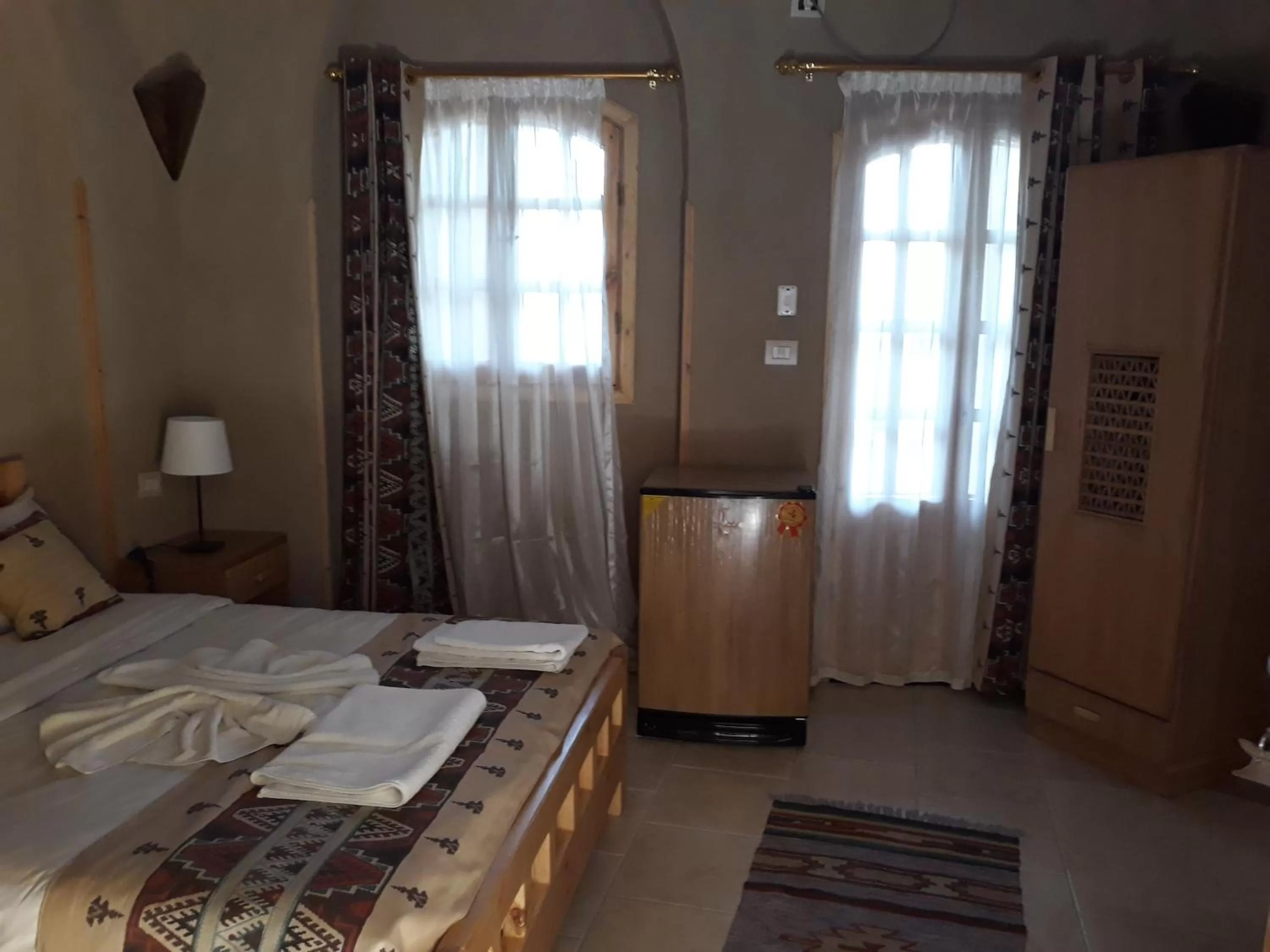 Bed in Embrace Hotel