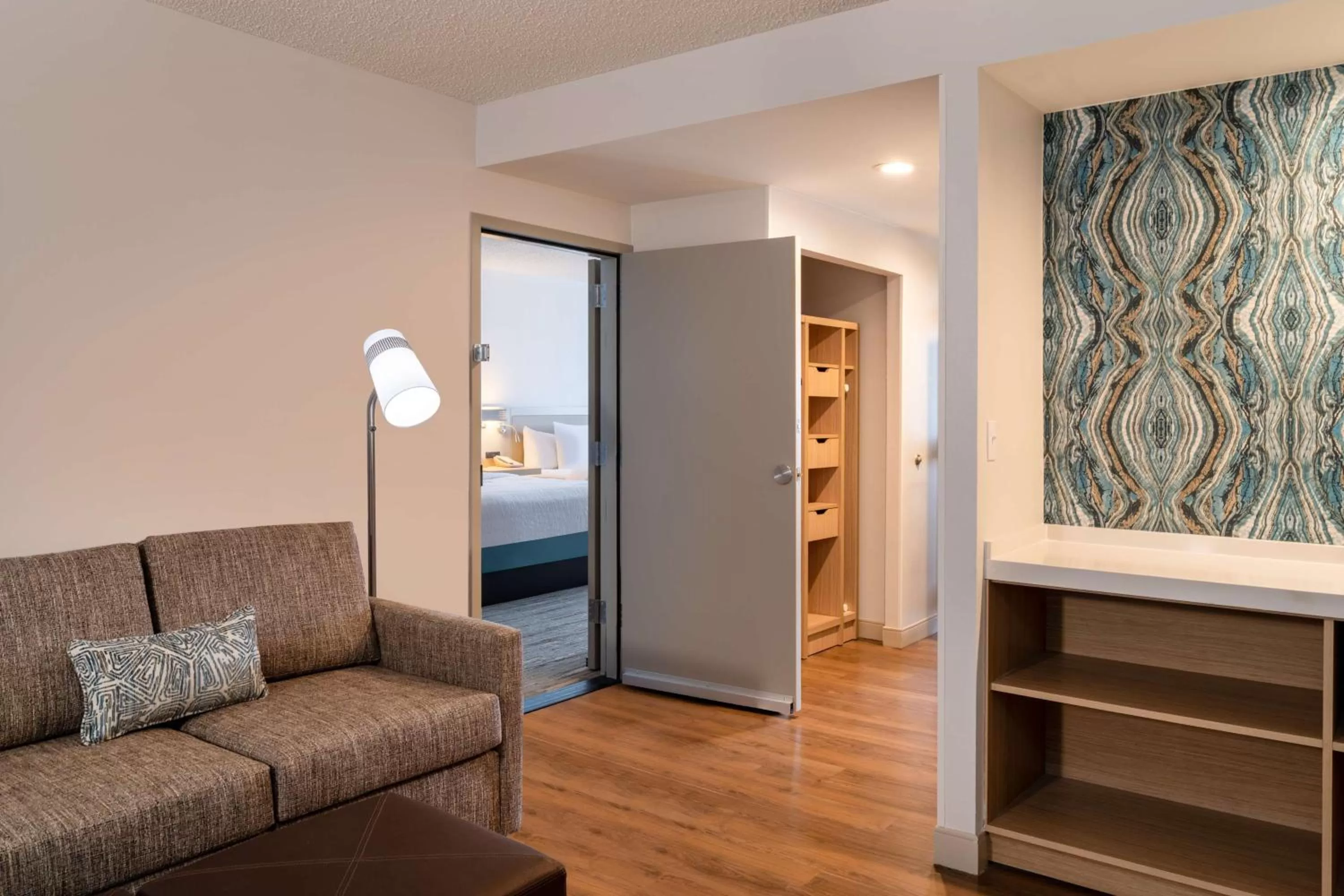 Living room, Bed in Hilton Garden Inn Jacksonville Ponte Vedra Sawgrass