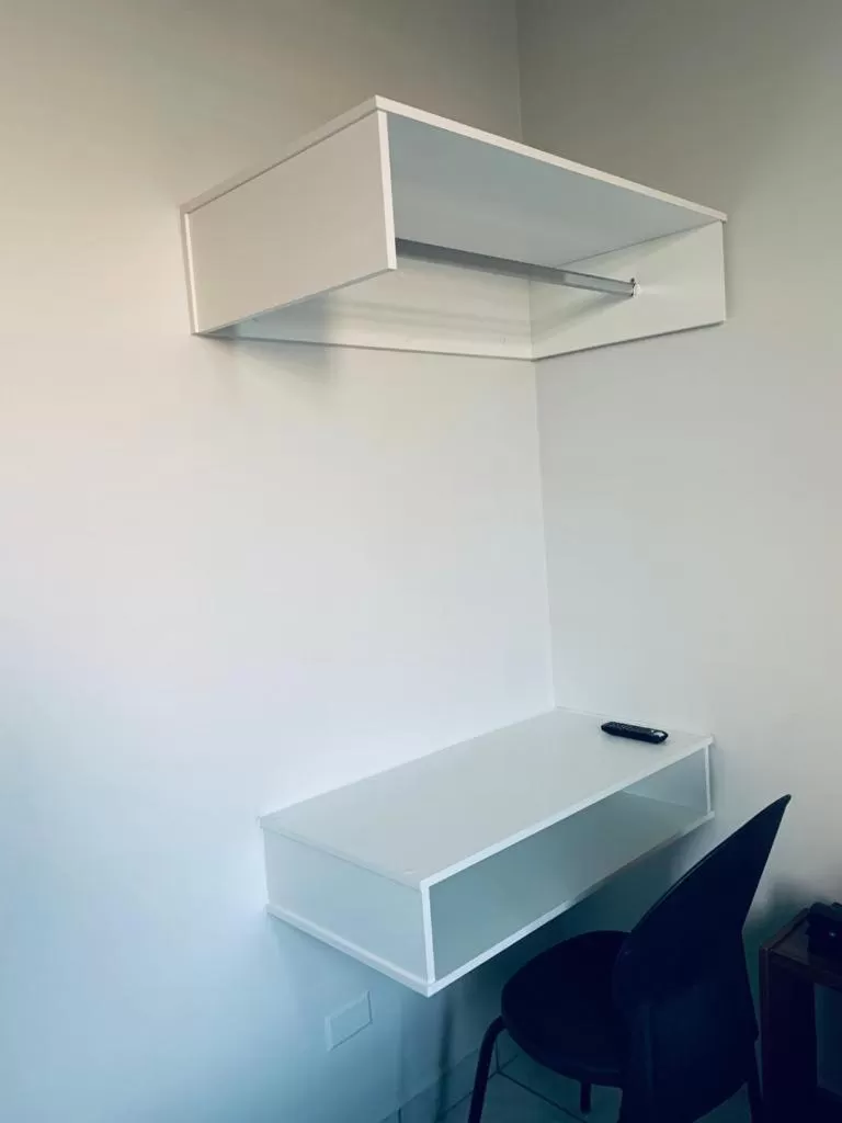 hair dresser, TV/Entertainment Center in Hotel Central de Anápolis