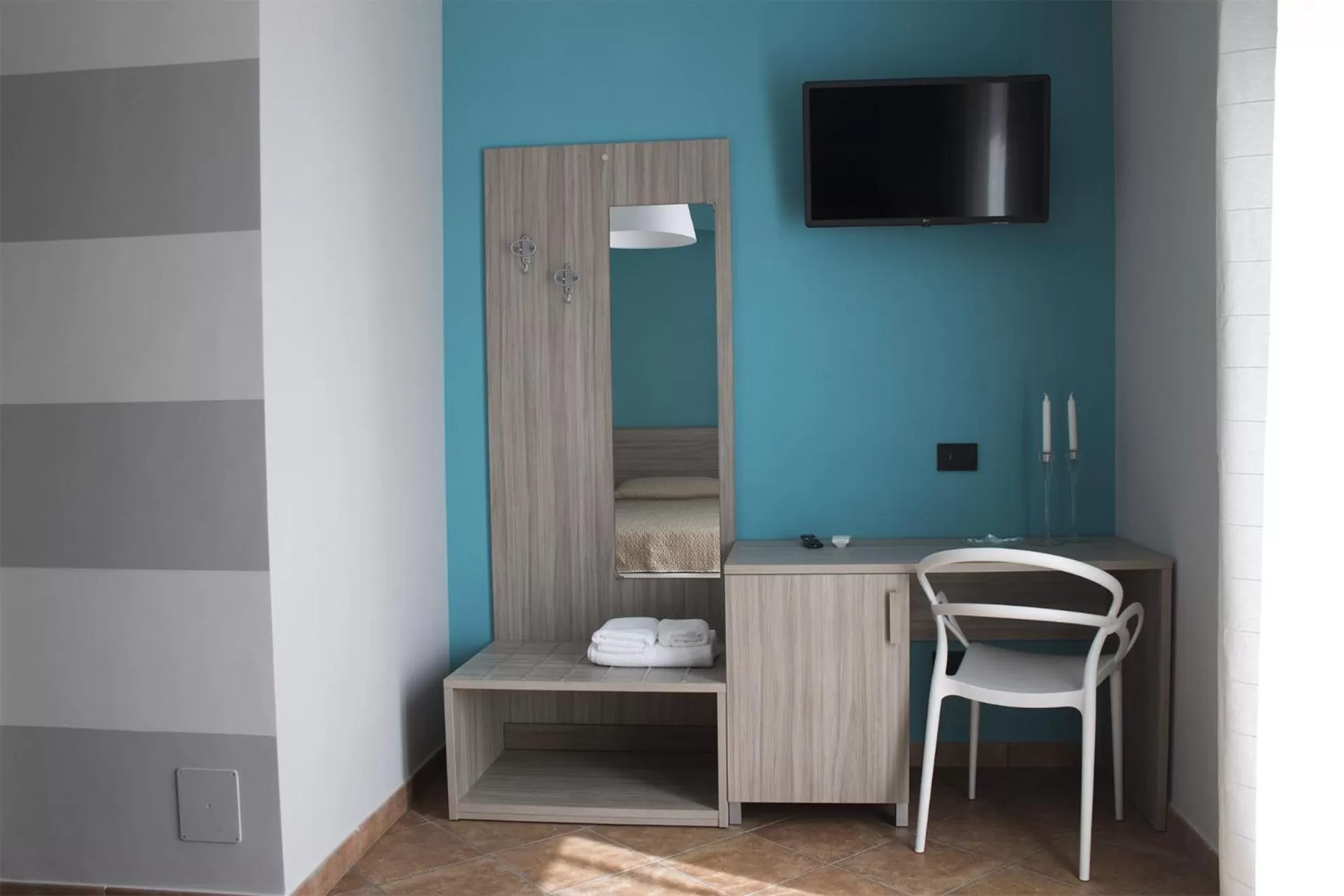 TV/Entertainment Center in Incanto Luxury Rooms