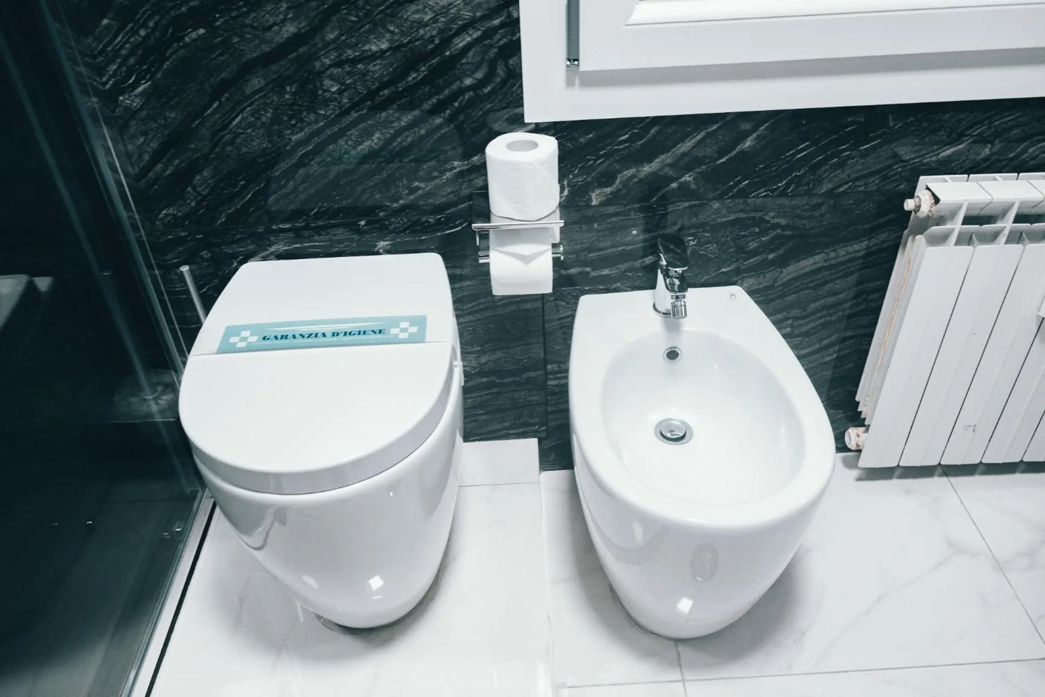 Bathroom in Gregorio VII Luxury Suites San Damaso