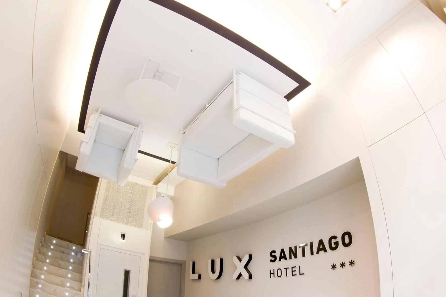 Lobby or reception in Hotel Lux Santiago