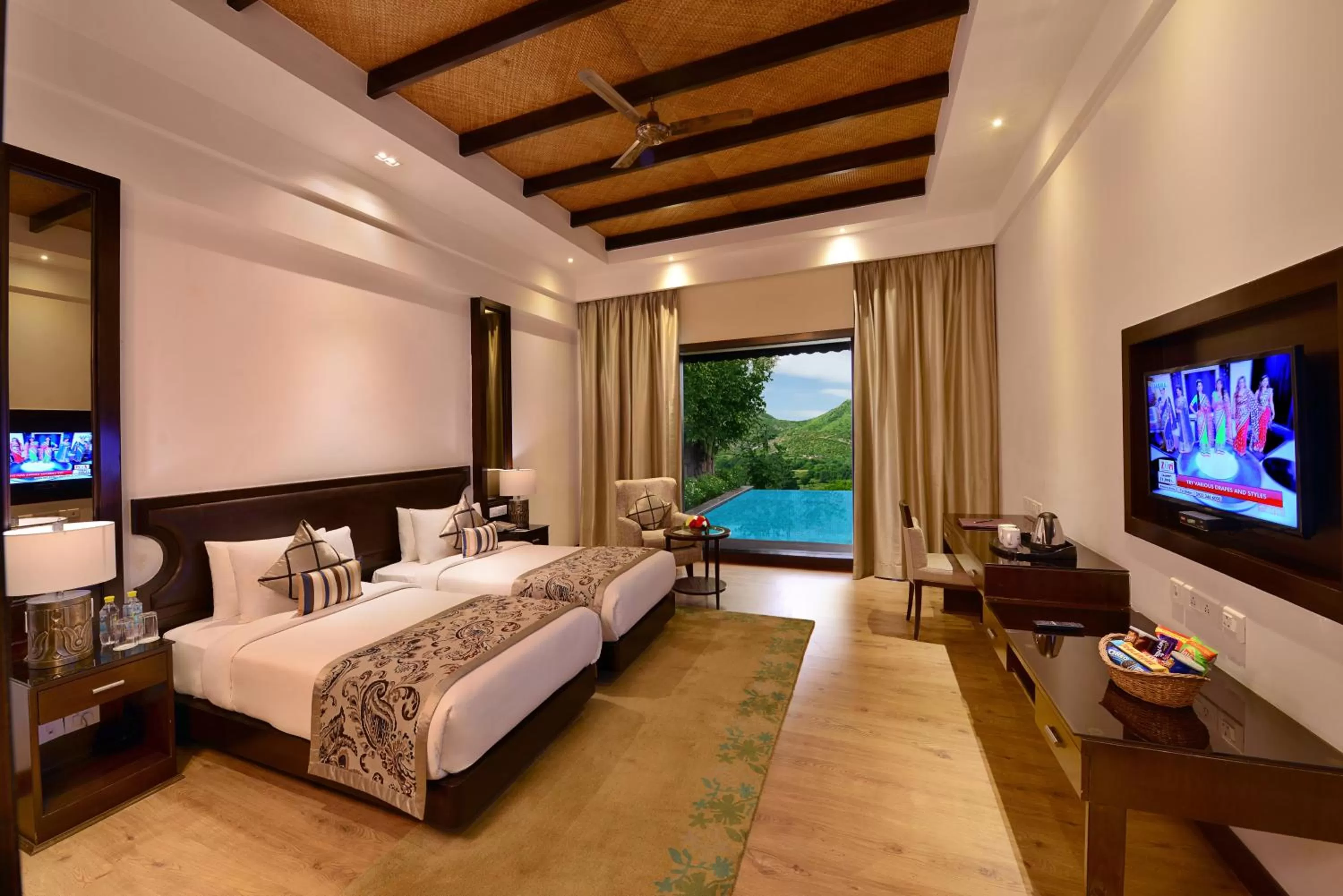 Pool view, Bed in The Ananta Udaipur