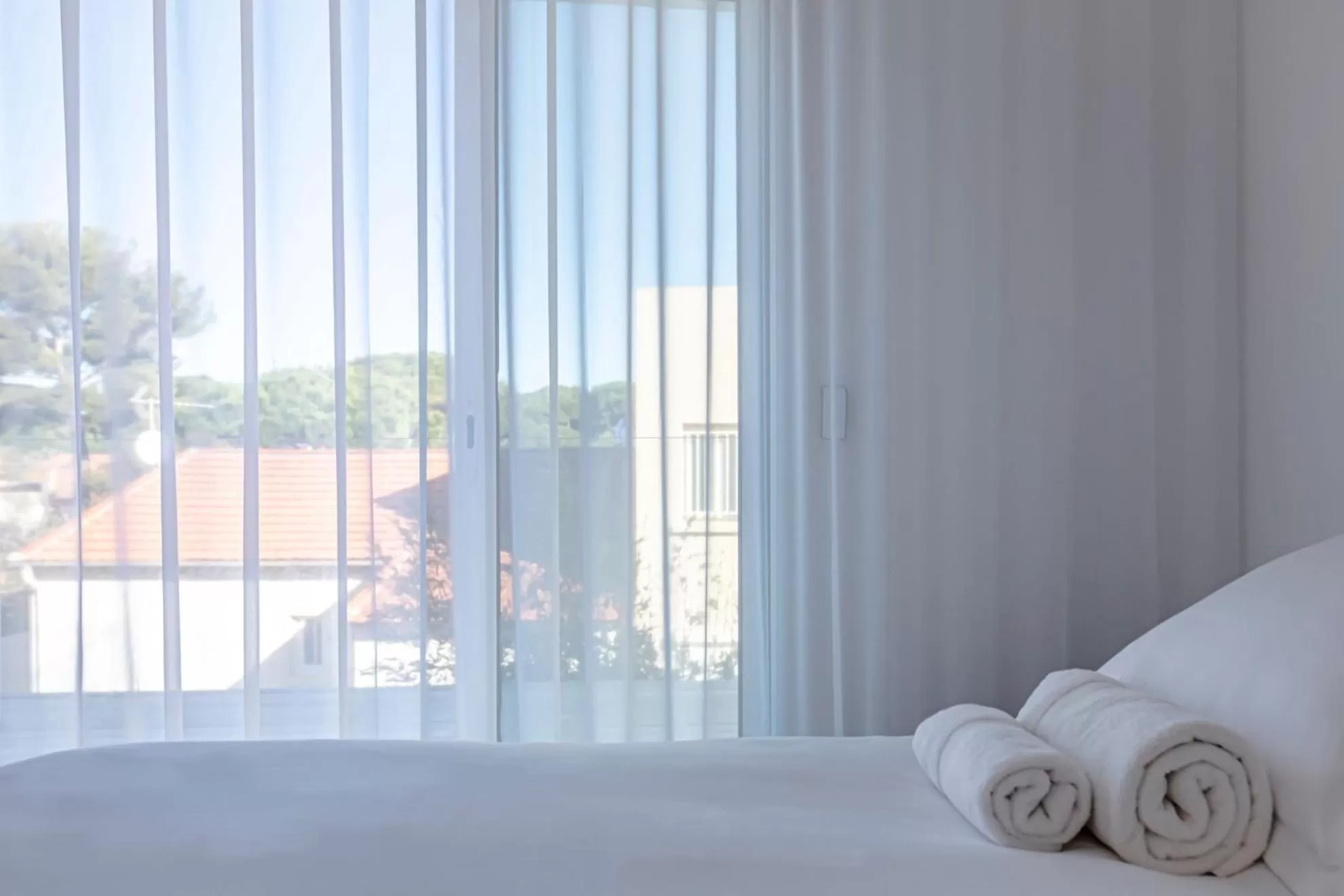 Bed in Hôtel La Reine Jane