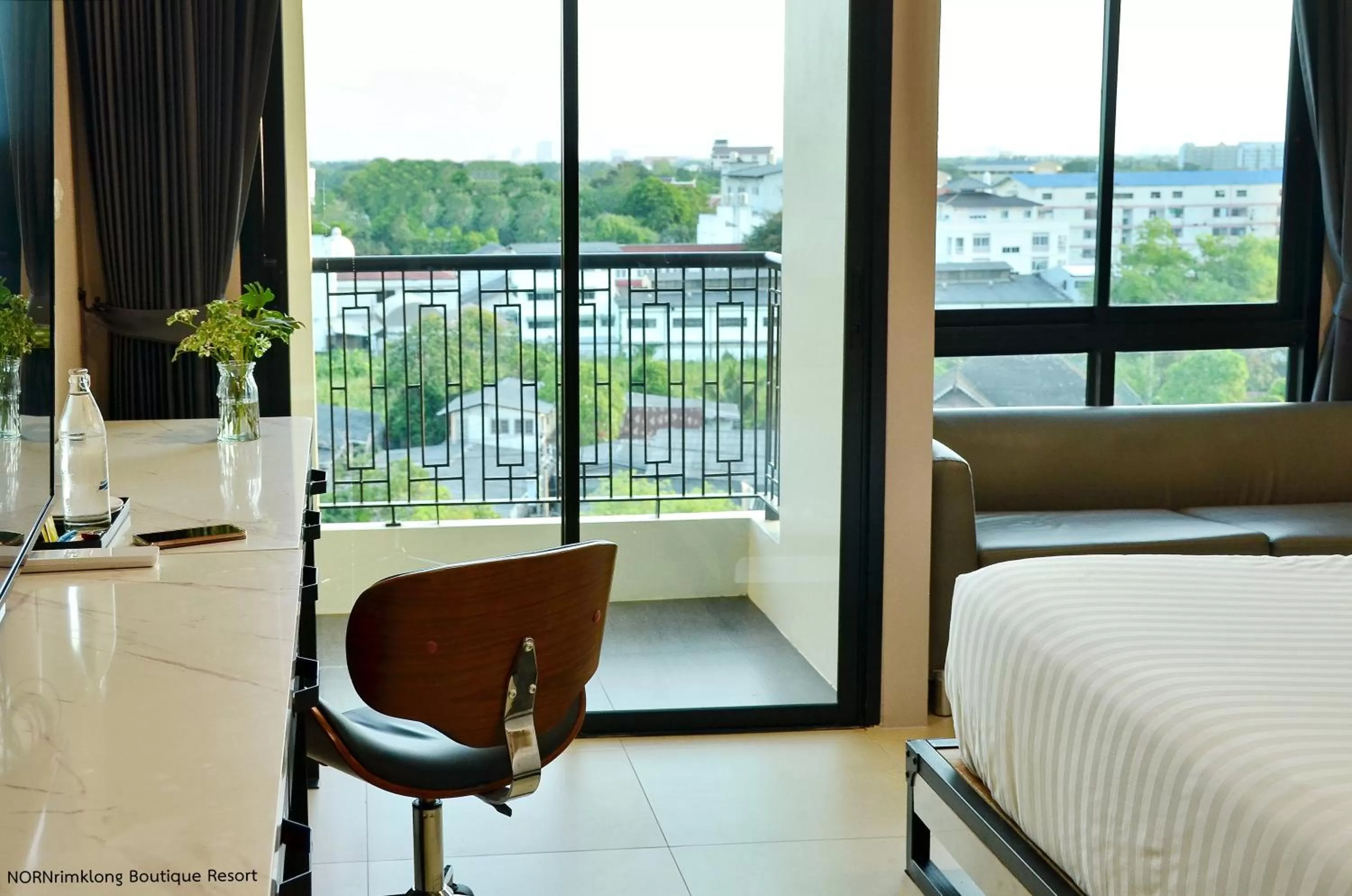 View (from property/room), Bed in NORN Rimklong Bangkok Hotel