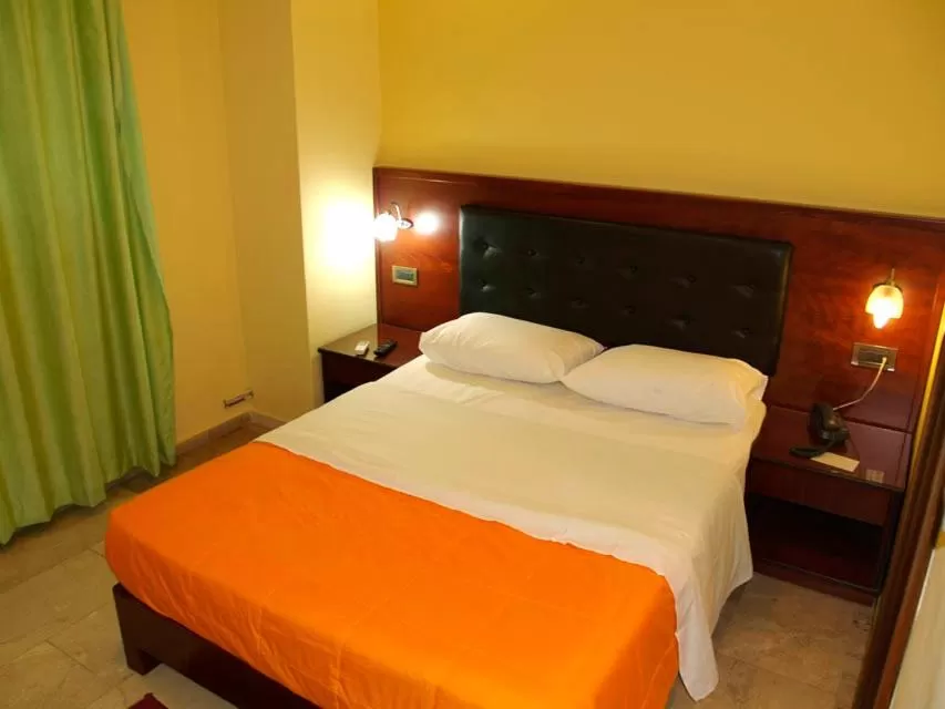 Bed in Hotel Filoxenia