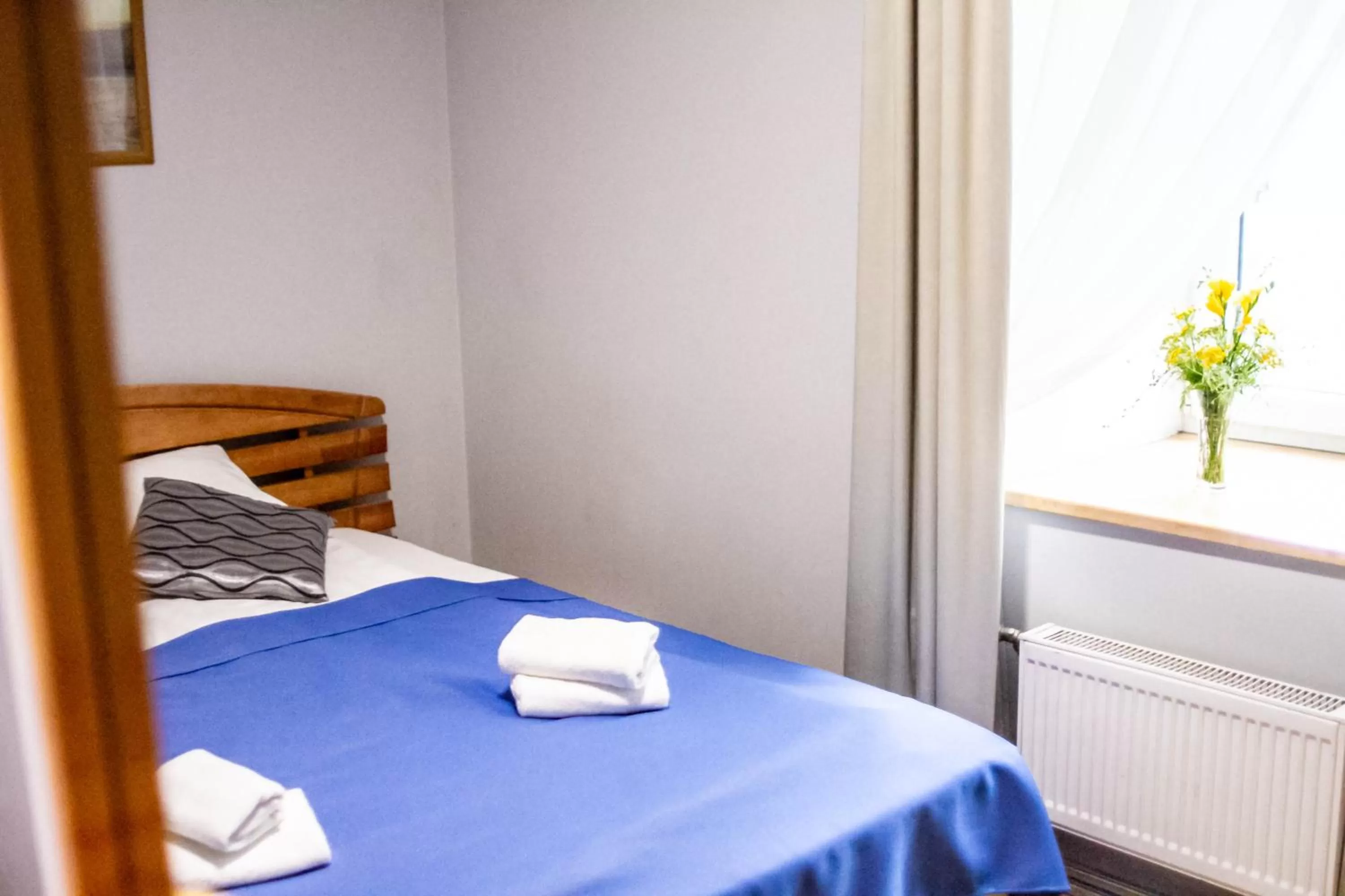 Photo of the whole room, Bed in Sunset Hotel