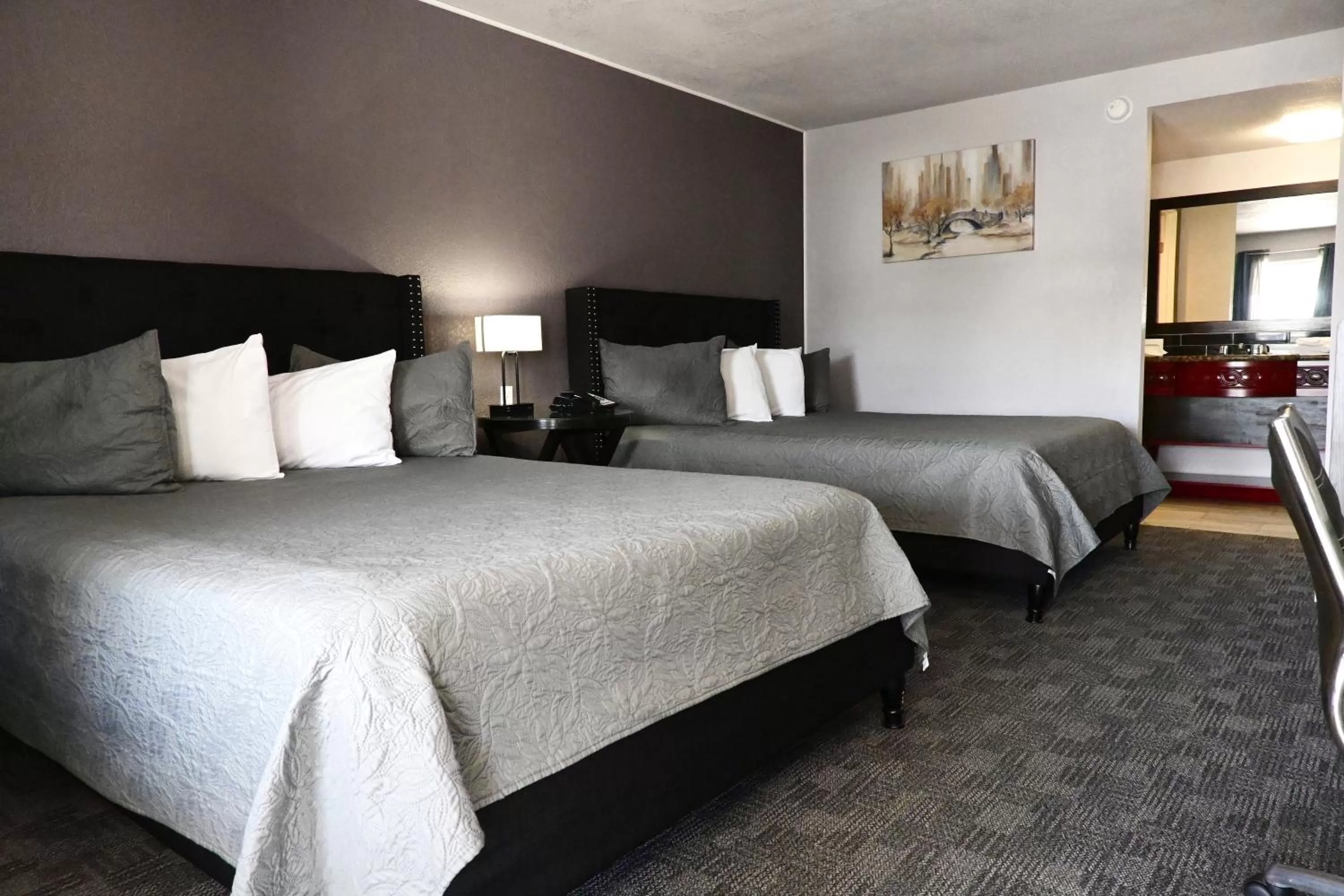 Bed in R Nite Star Inn and Suites -Home of the Cowboys & Rangers