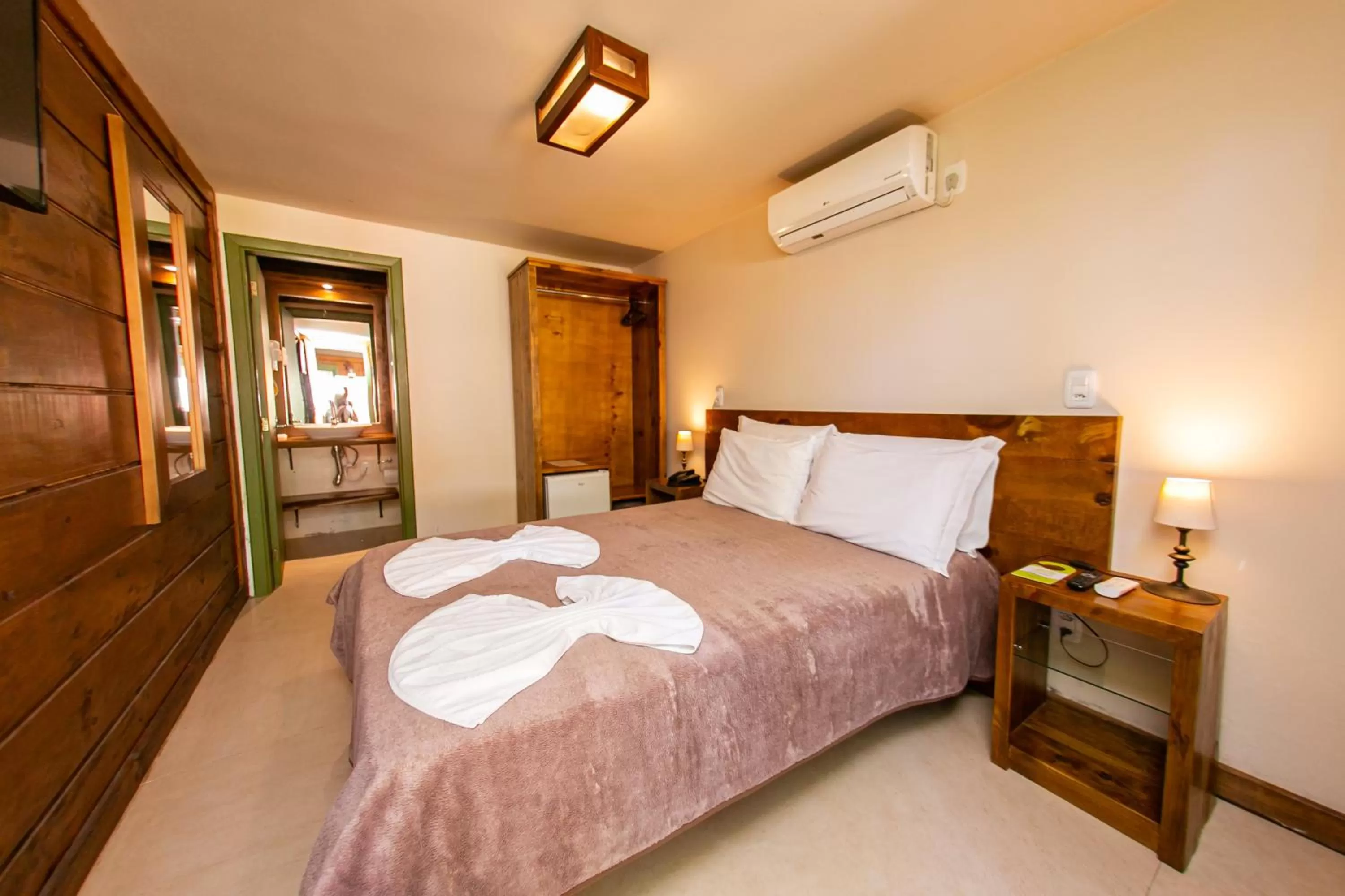 Bed in Pousada Charm Canela