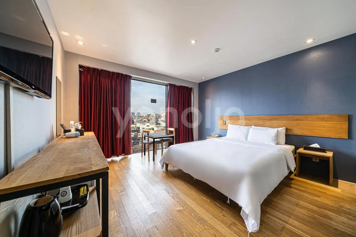 Bed in La Villa Hotel