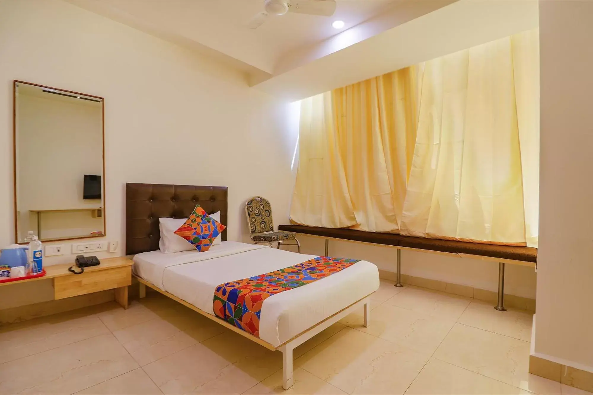 Deluxe Single Room - single occupancy in FabHotel Aamantran & Banquet Halls - Nr RTC X Roads Metro Station Deluxe Single Room - single occupancy in FabHotel Aamantran & Banquet Halls - Nr RTC X Roads Metro Station