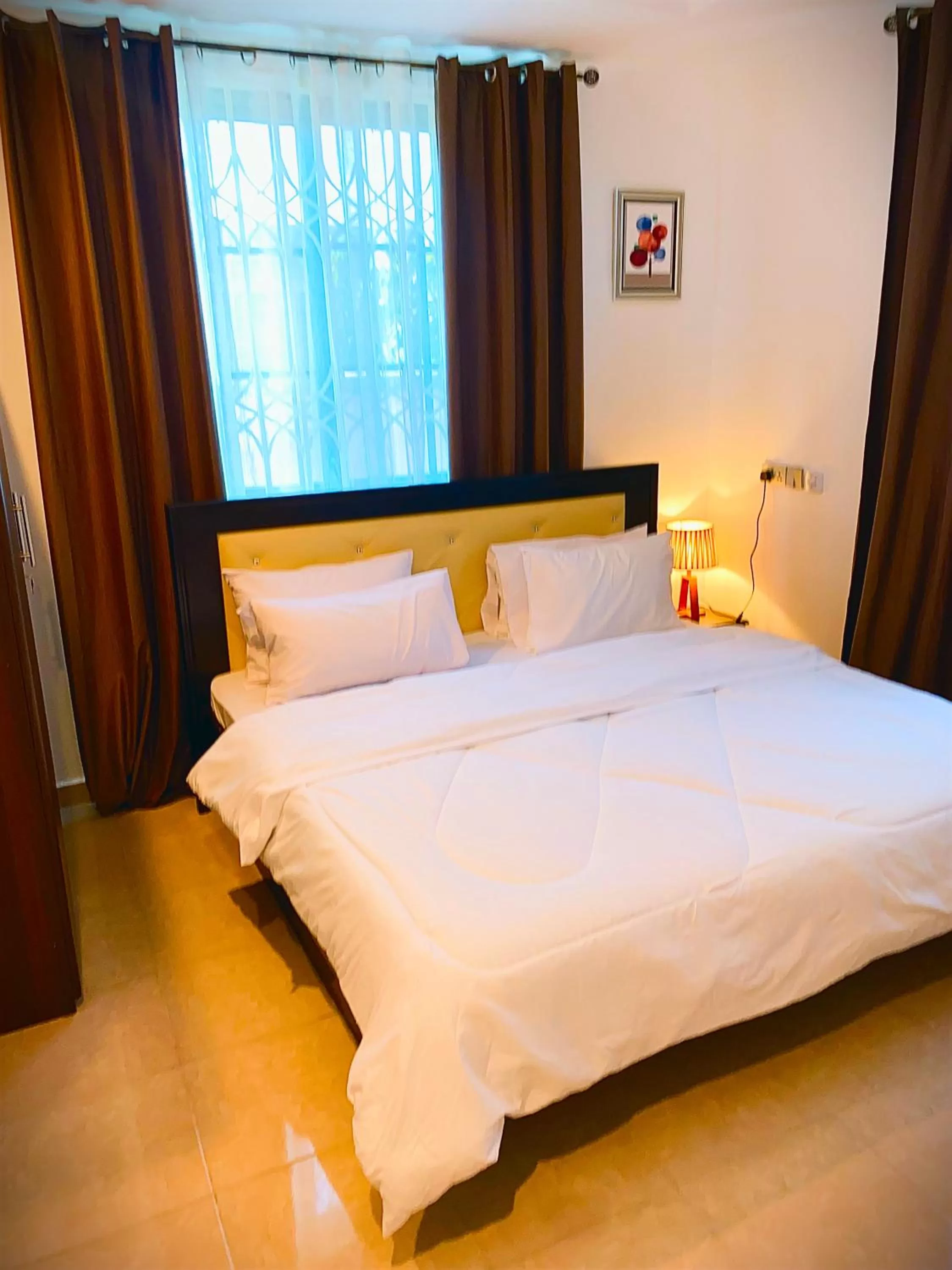 Bed in AIDEN HOMES AND APARTMENTS