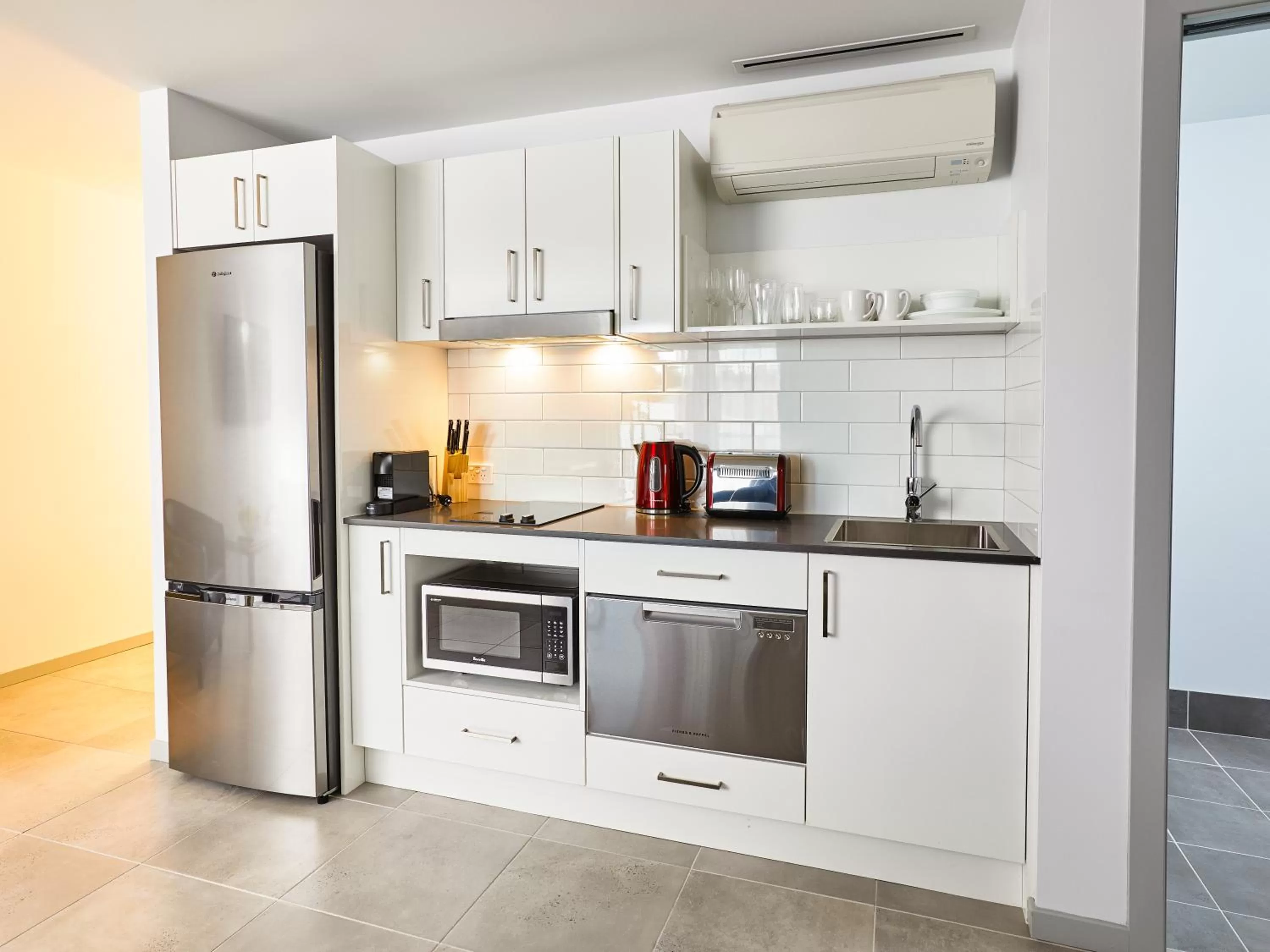 Coffee/tea facilities in East Maitland Executive Apartments