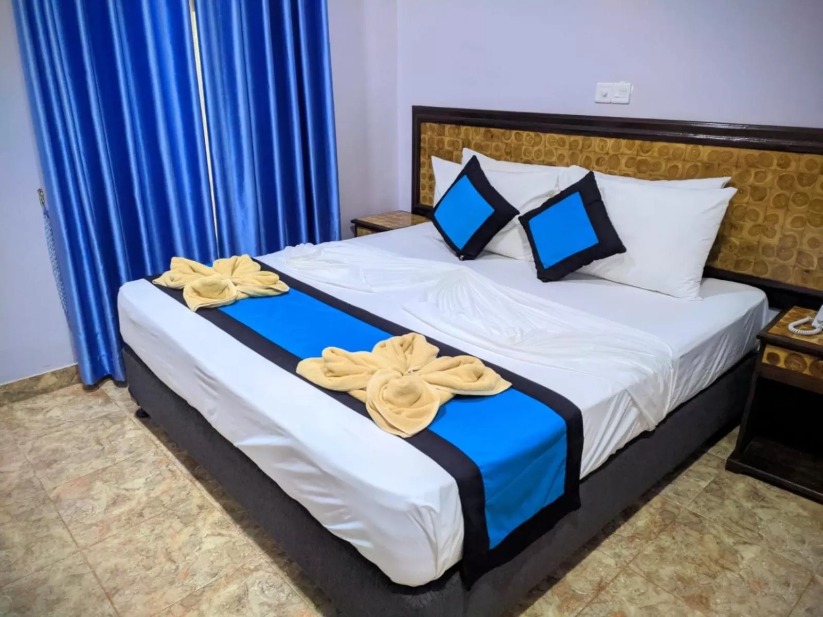 Bed in Blue Sand Beach Resort