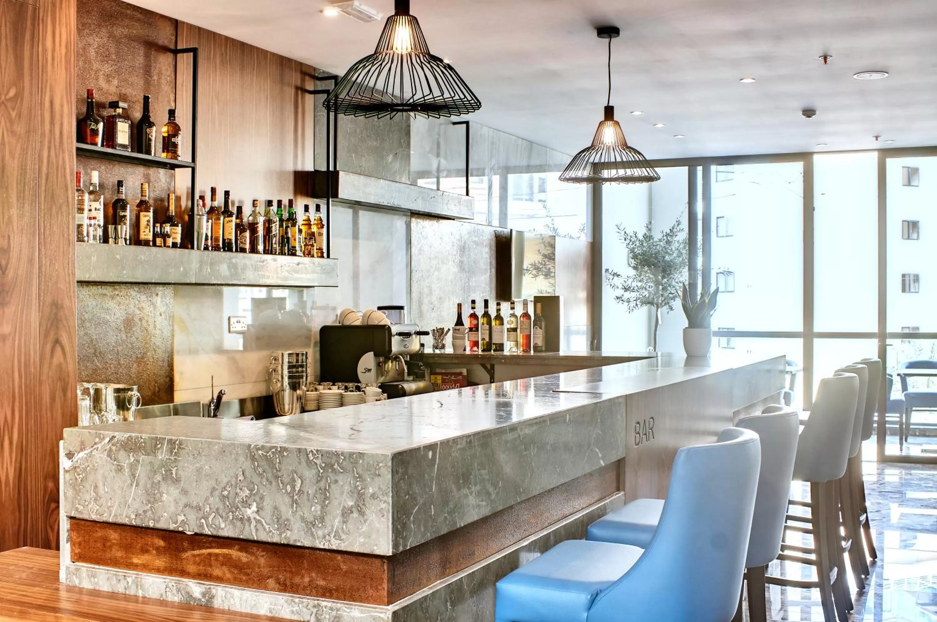 Lounge or bar in The District Hotel