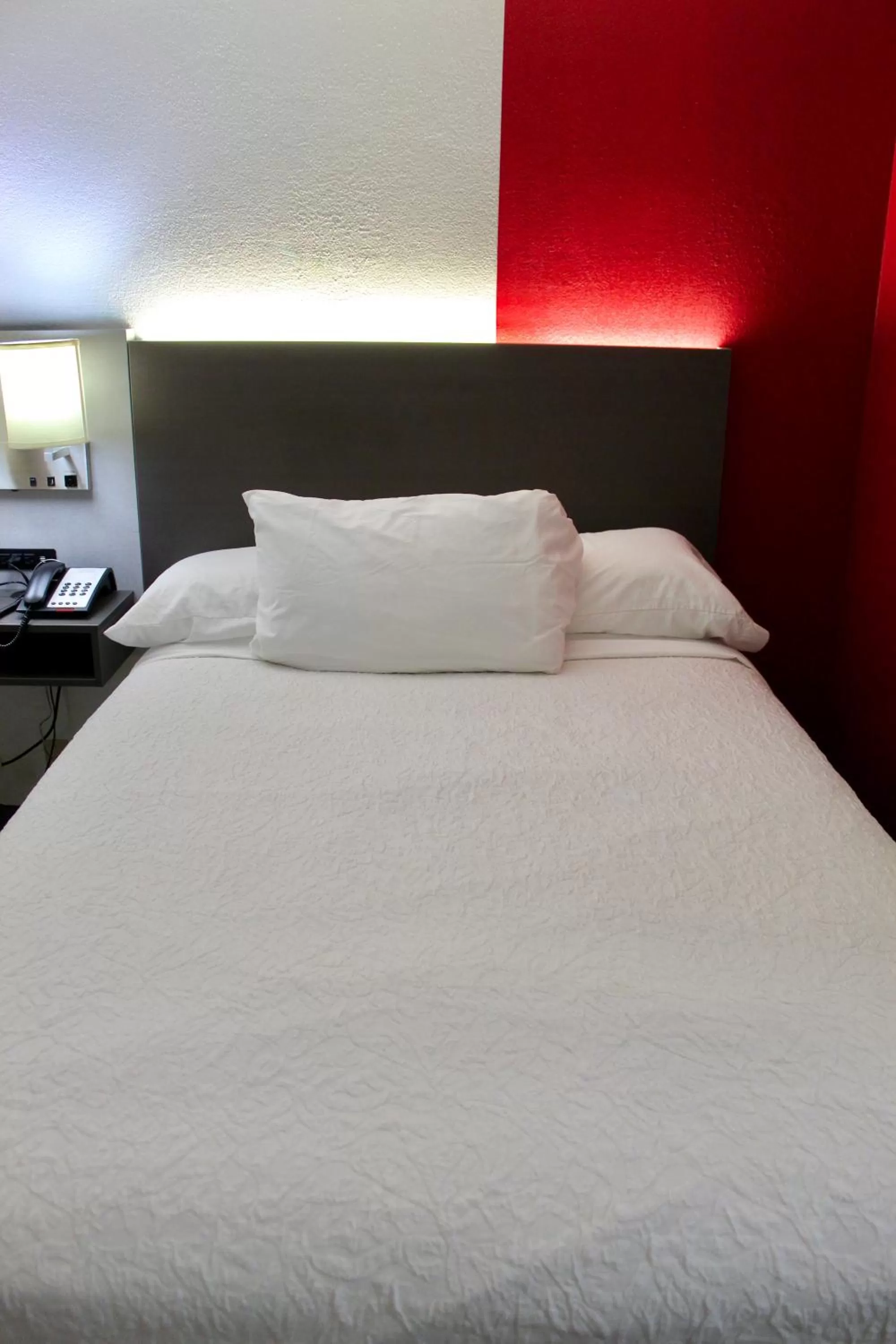 Bed in Ramada by Wyndham Harrisonburg