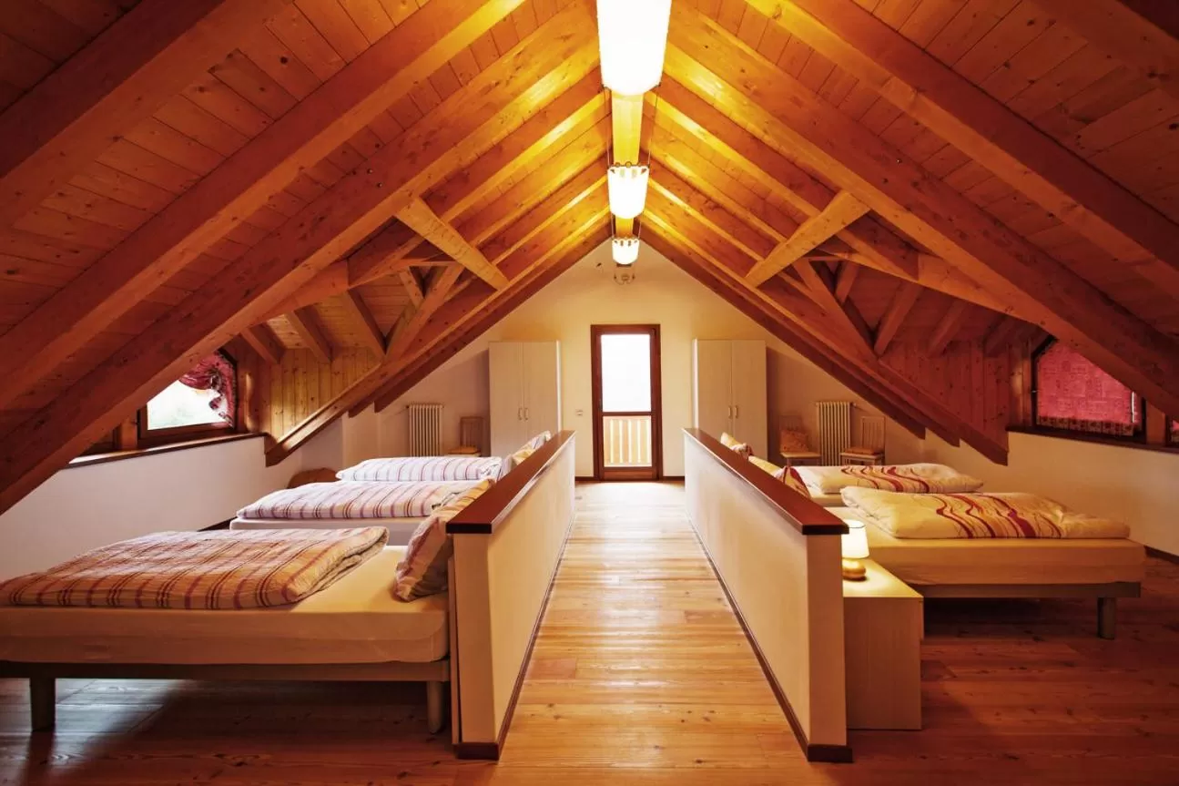 Photo of the whole room, Bed in Albergo Diffuso Tolmezzo