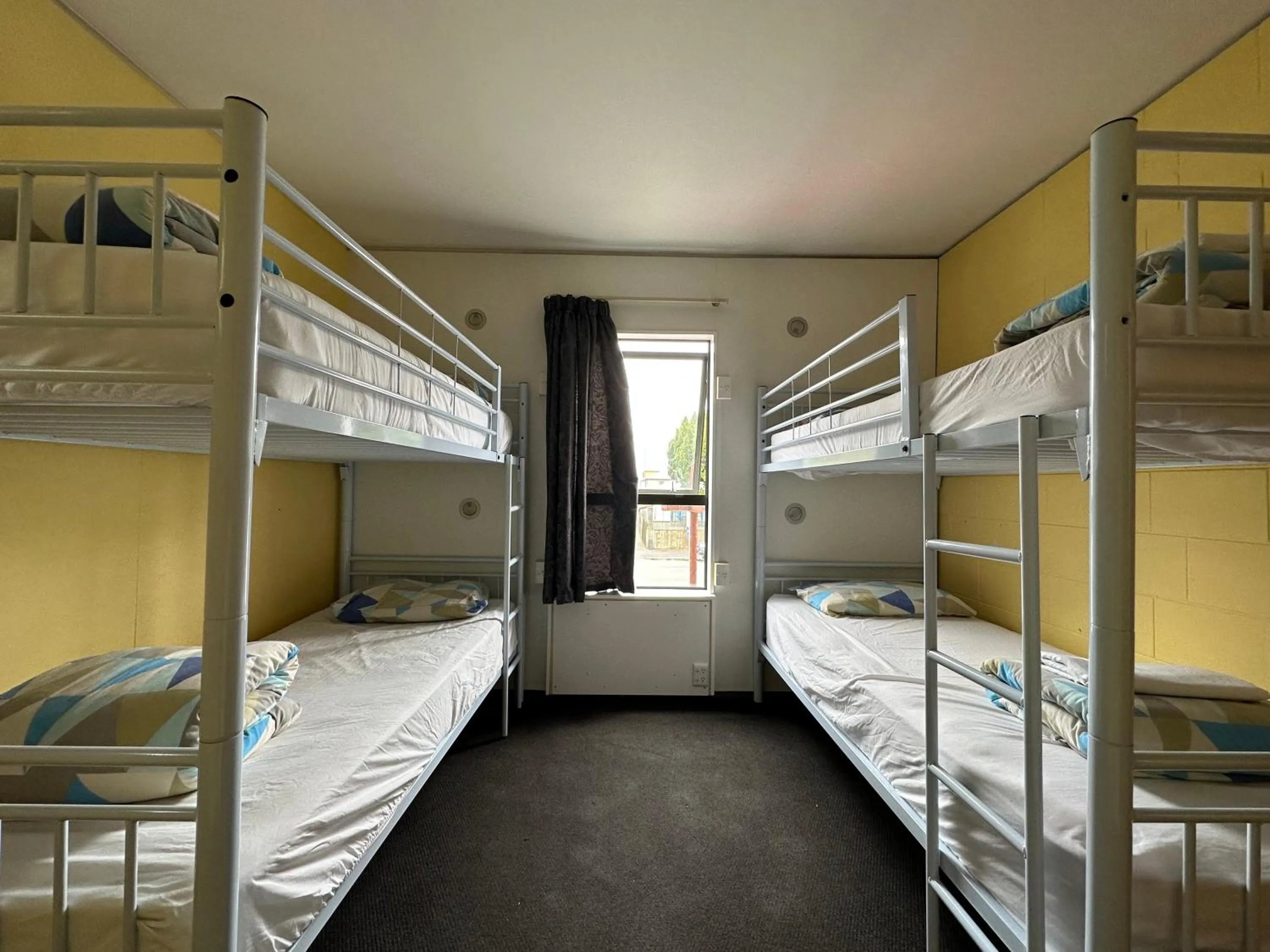 Bed in Around The World Backpackers