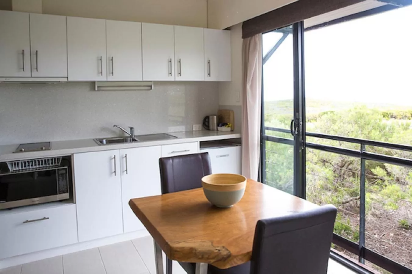Kitchen or kitchenette in Margarets Beach Resort