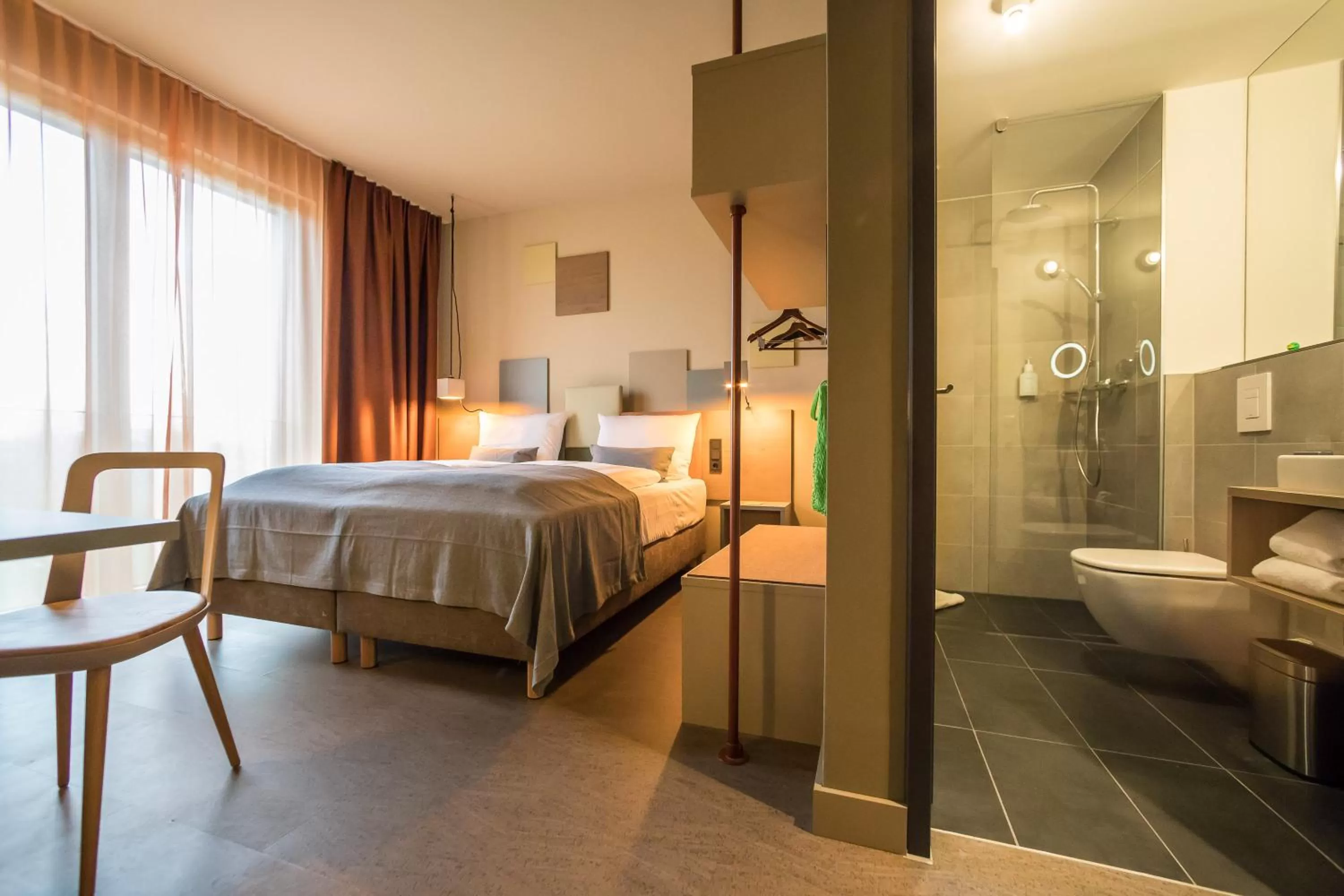 Bathroom, Bed in Hotel einsmehr