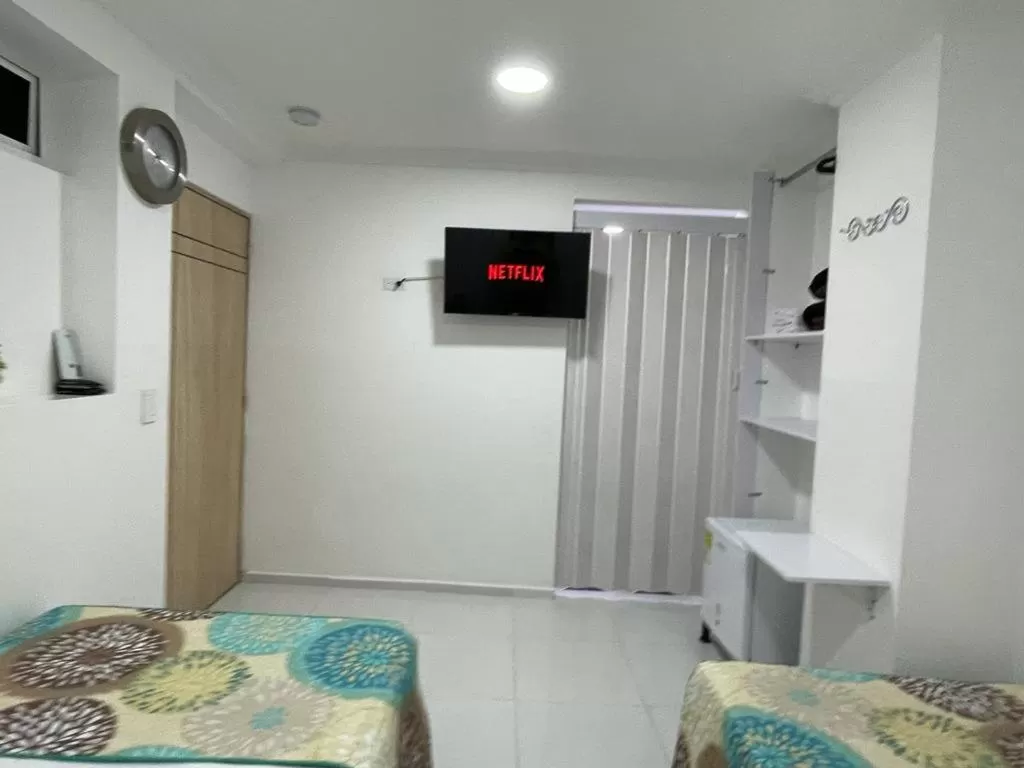 Photo of the whole room, TV/Entertainment Center in Hotel Eterna Primavera