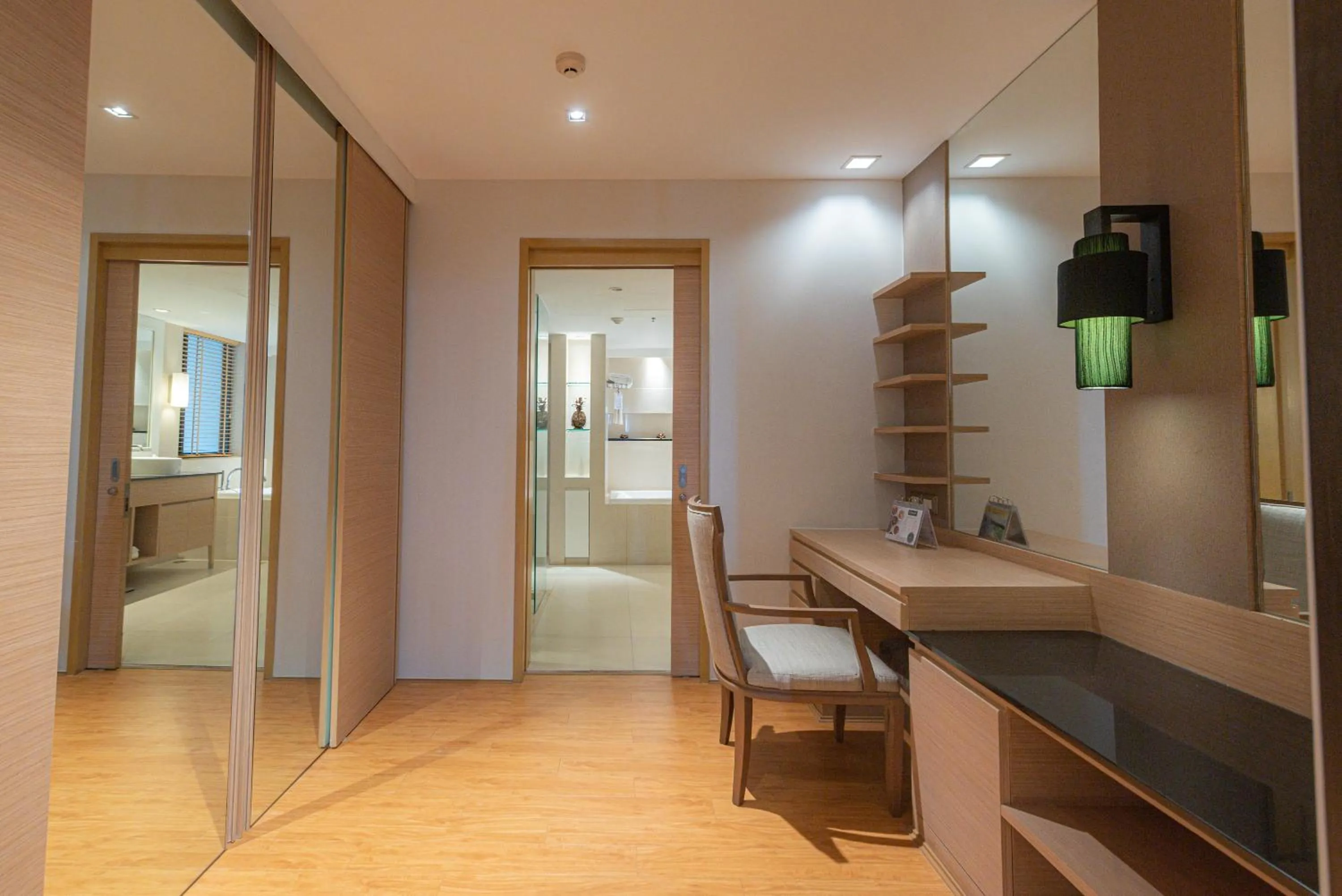 Living room in Summit Windmill Golf Suite Hotel at Suvarnabhumi