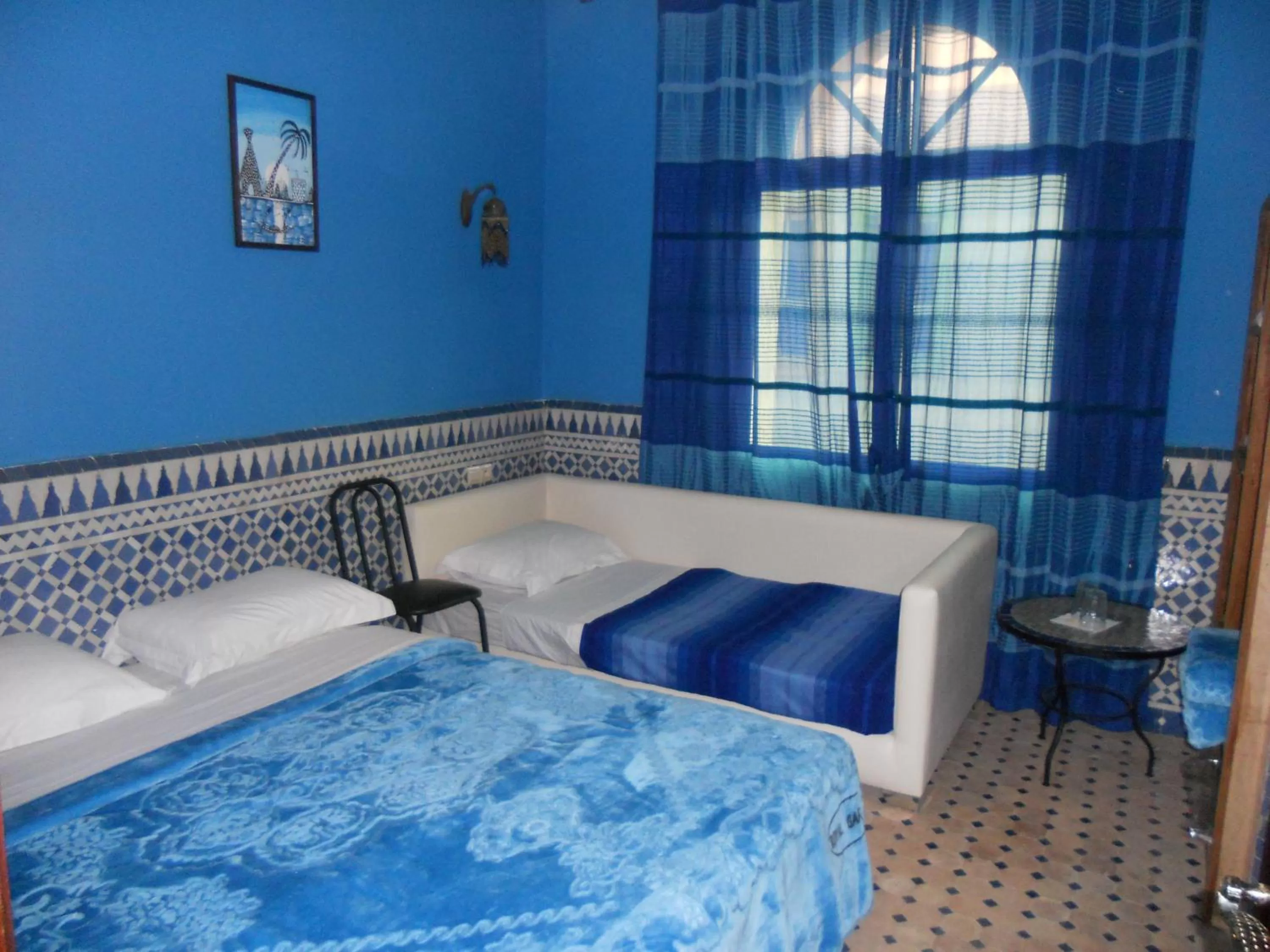 Bed in Riad Passiflora