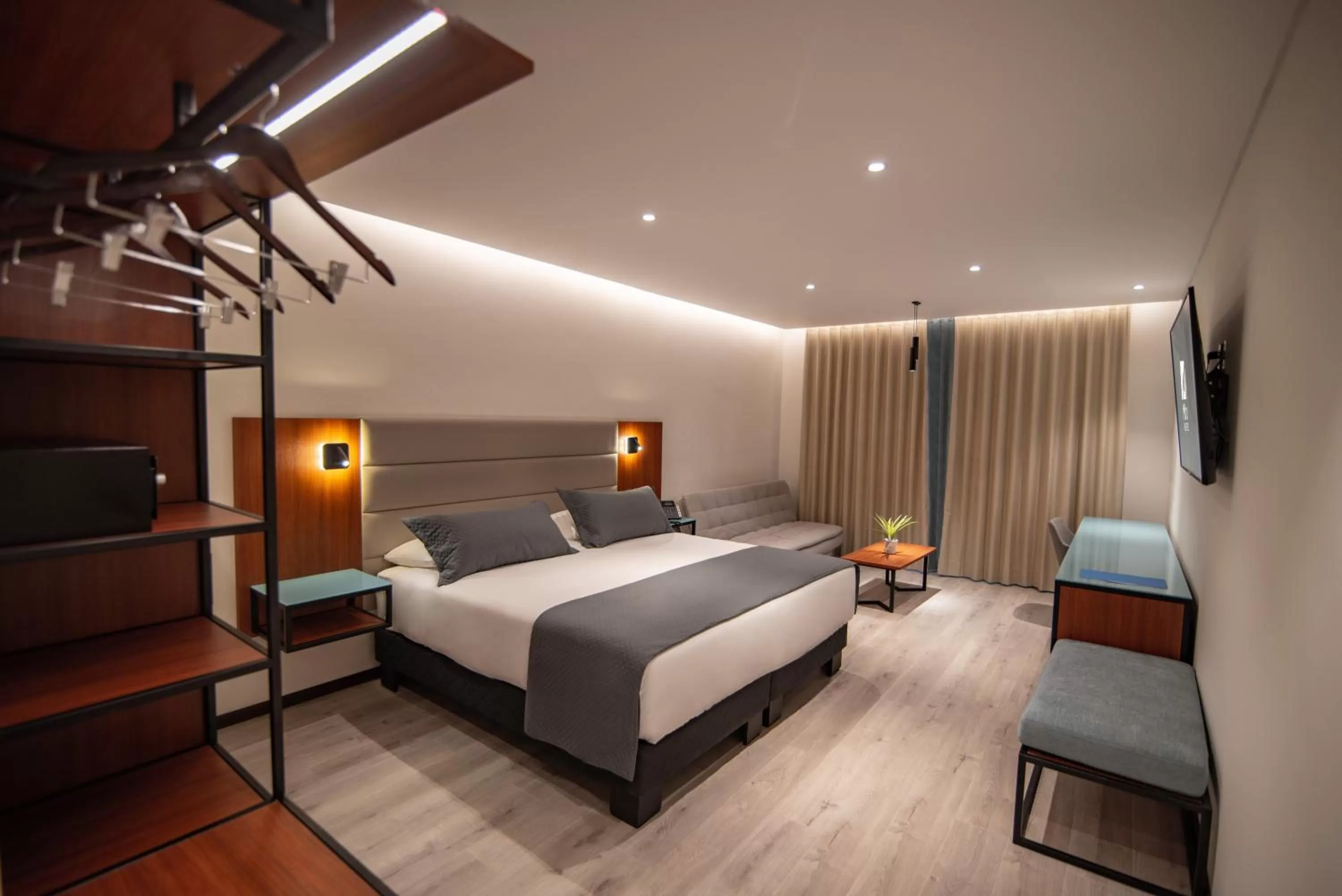 Living room, Bed in Mitru Express Hotel