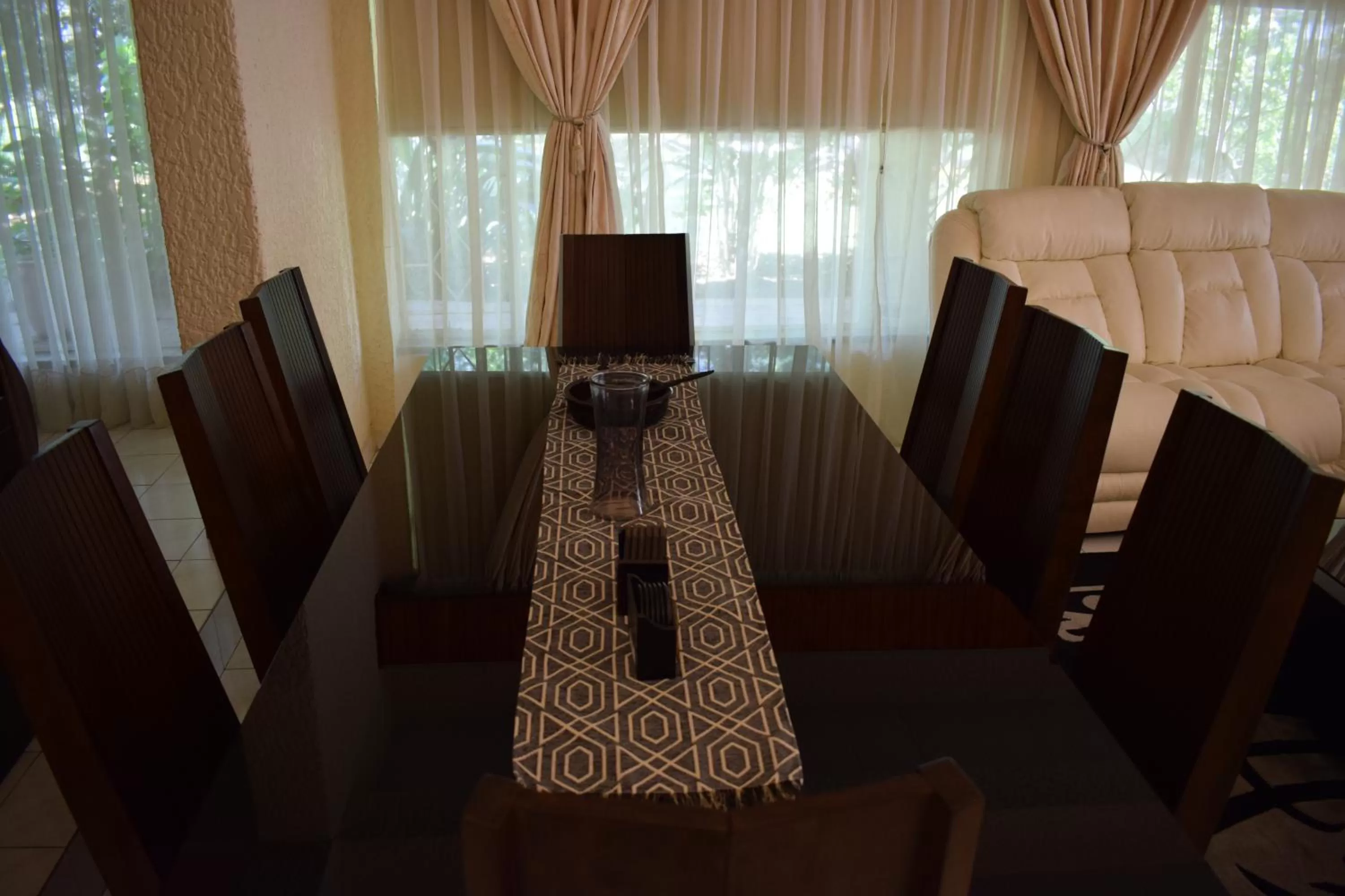 Dining area, TV/Entertainment Center in Moye Guest House