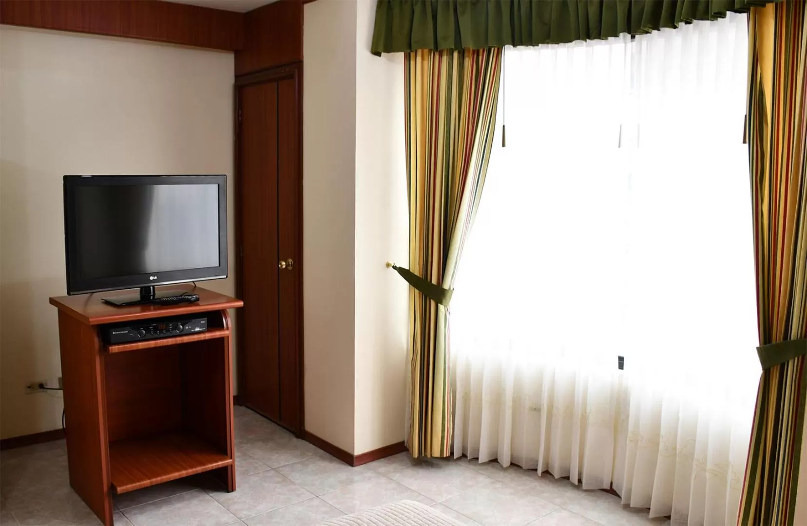 TV/Entertainment Center in REGAL HOTEL