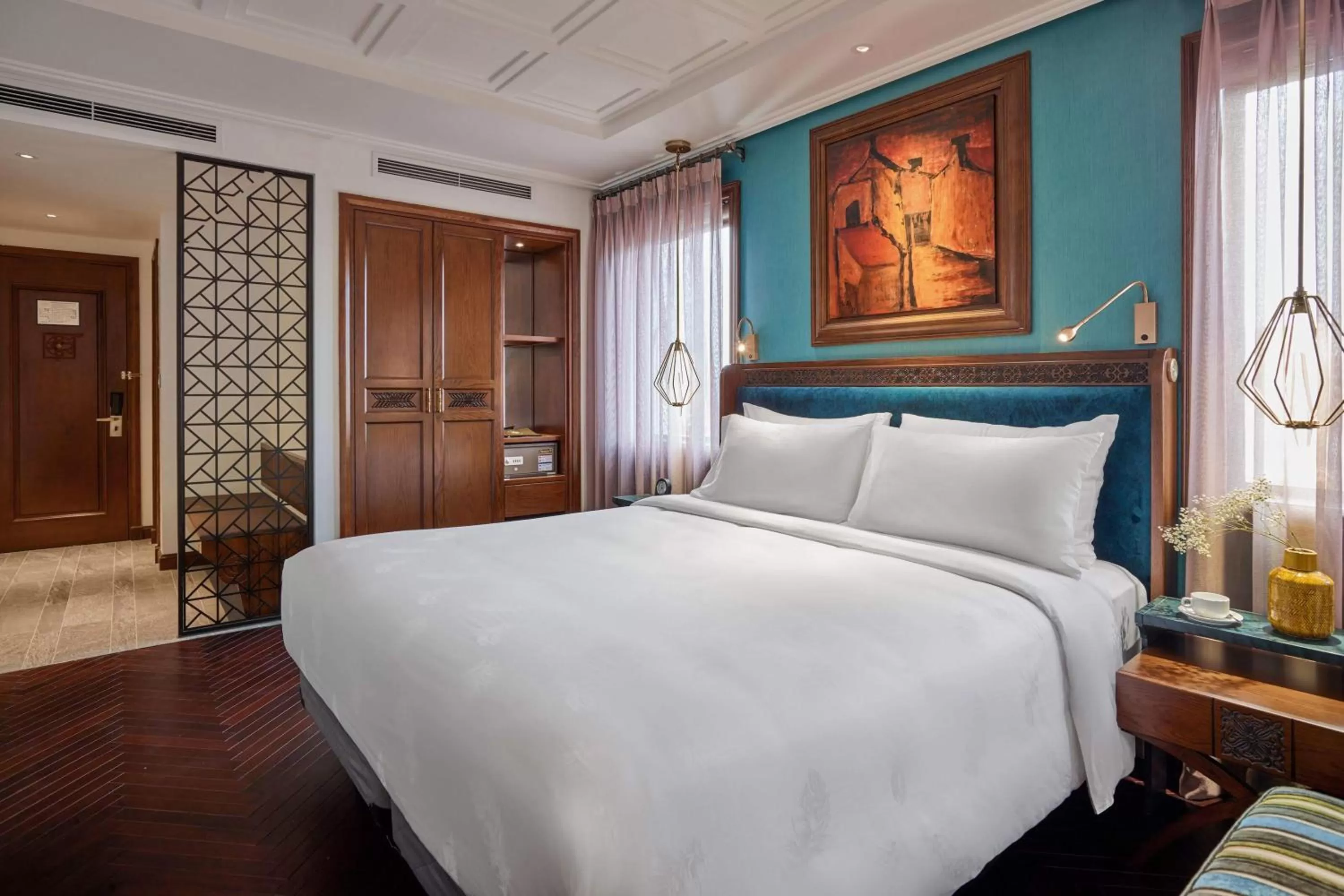 Bed in Peridot Grand Luxury Boutique Hotel