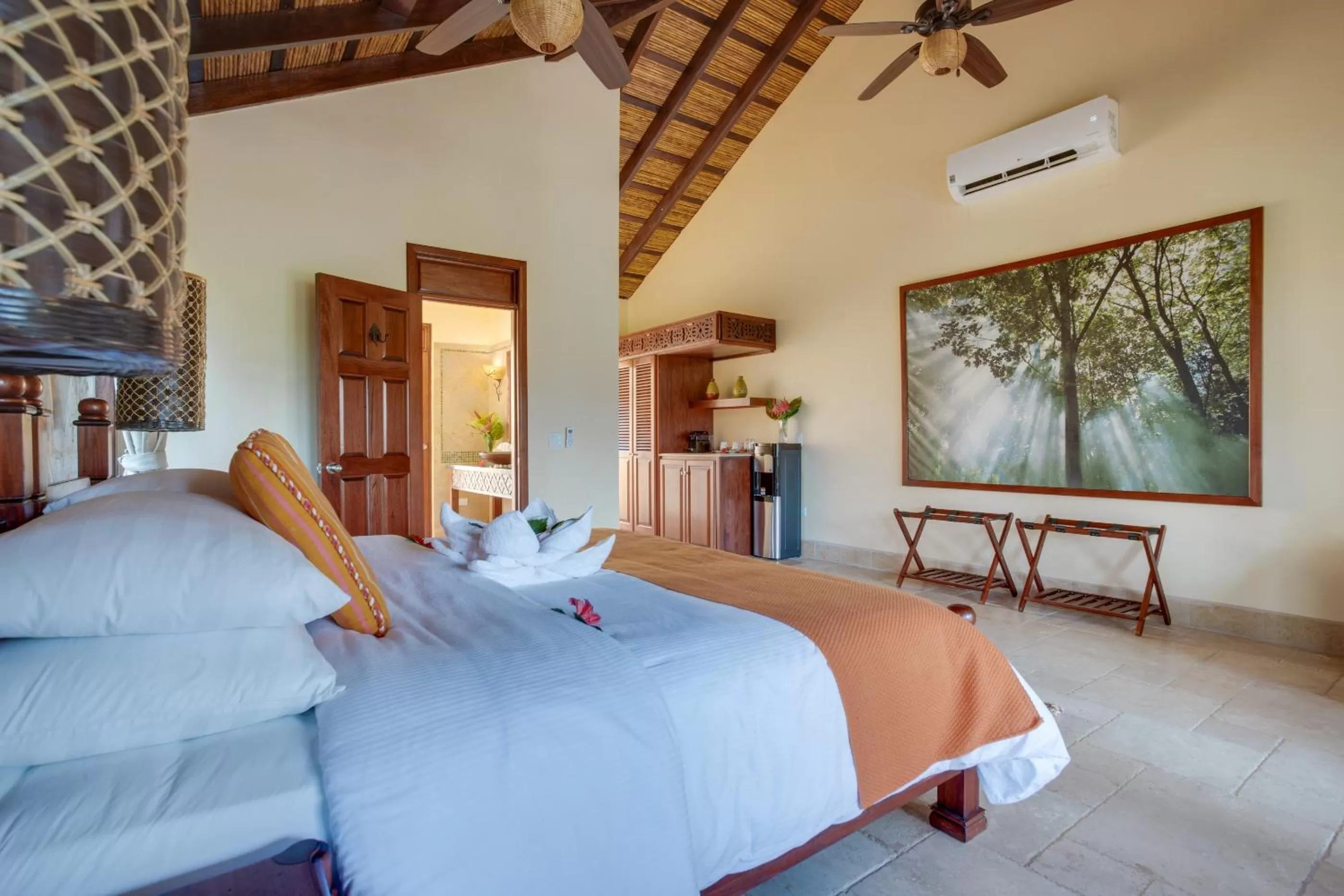 Bed in Sleeping Giant Rainforest Lodge