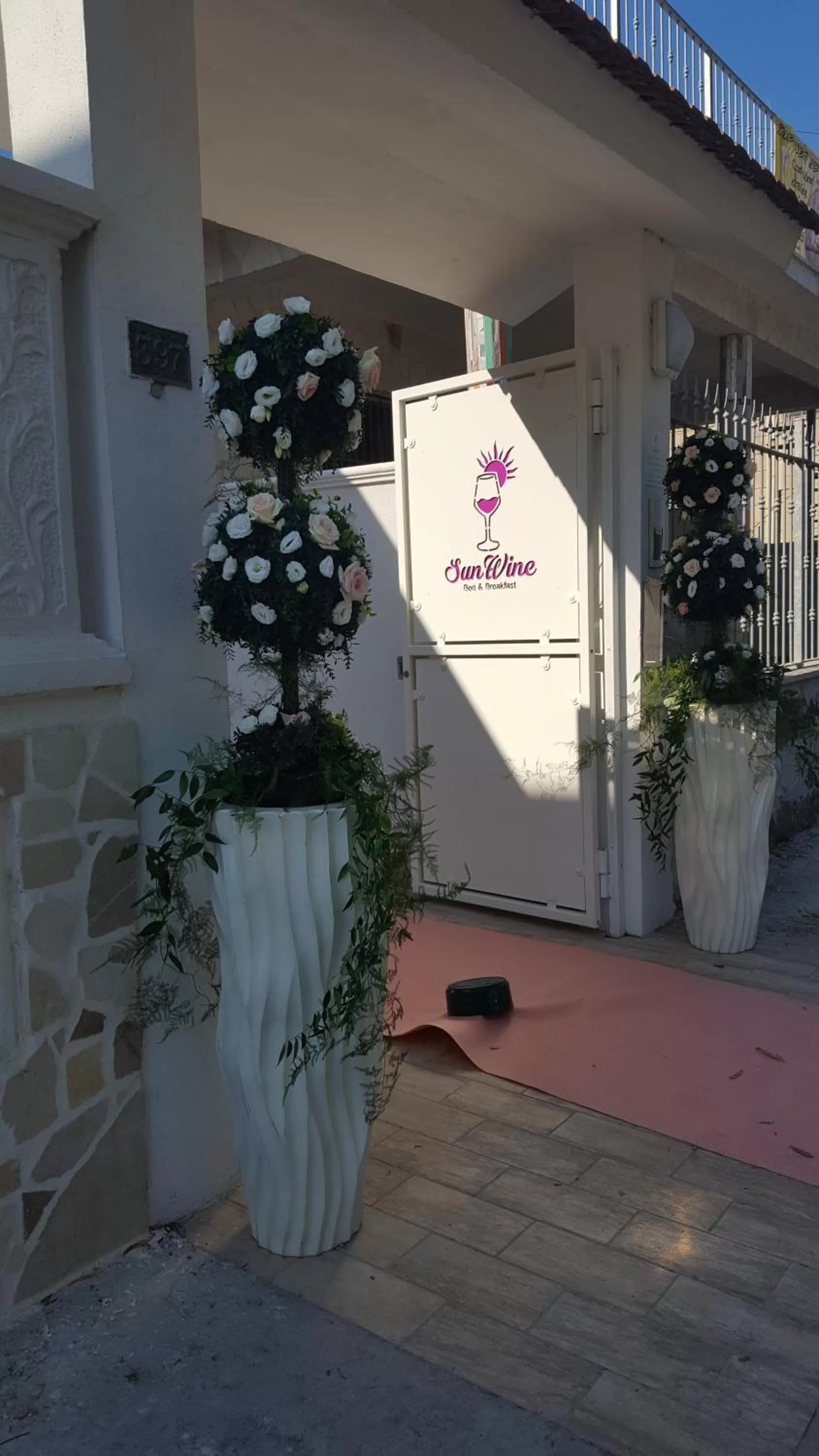 Property logo or sign in Bed and Breakfast Sun Wine