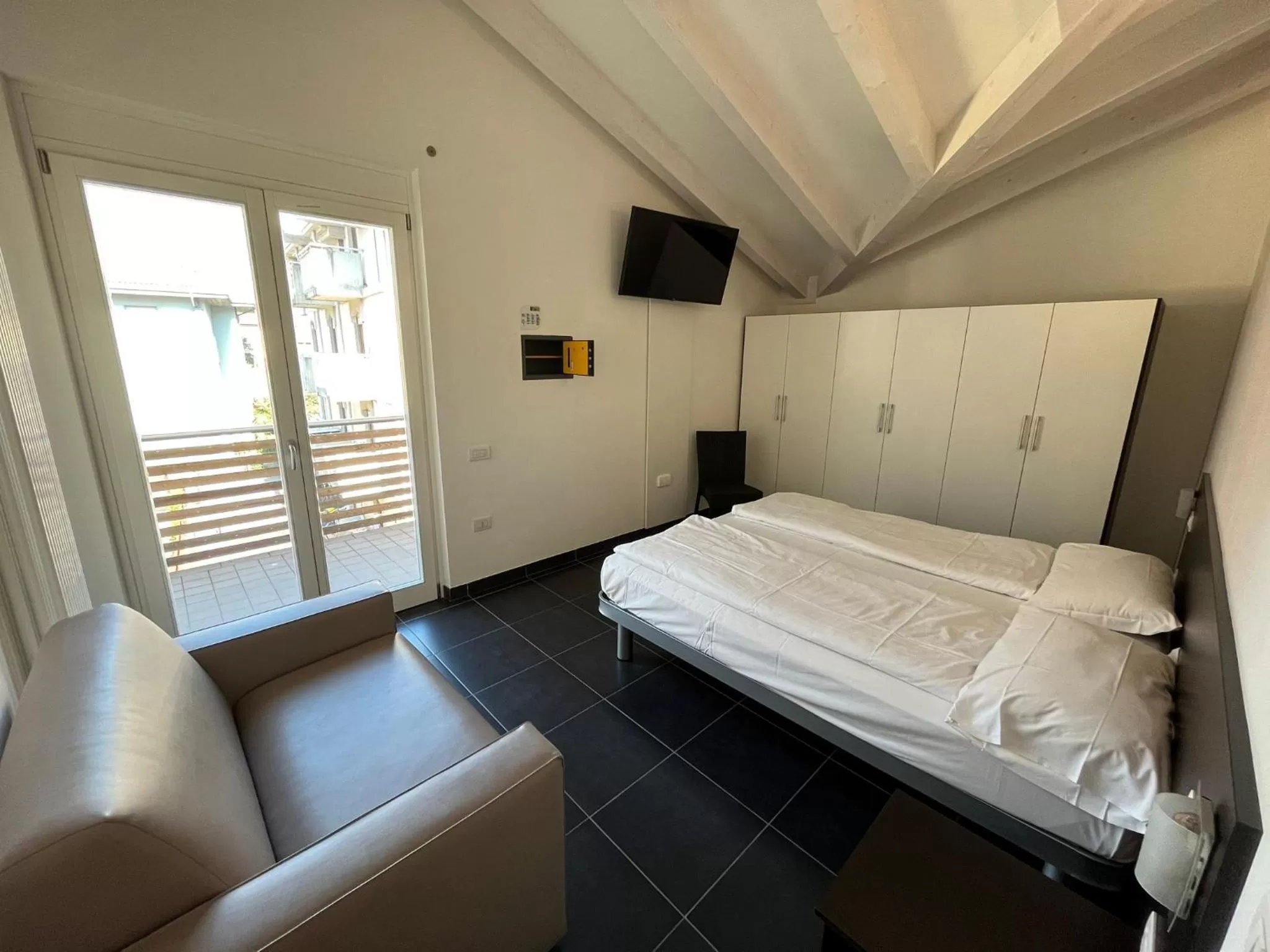 Bed in 4 Limoni Apartment Resort