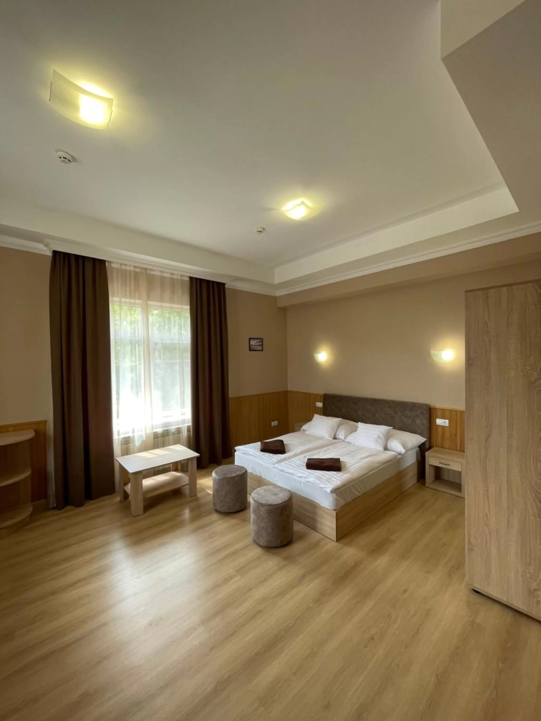 Photo of the whole room, Bed in Praktik Hotel & Restaurant