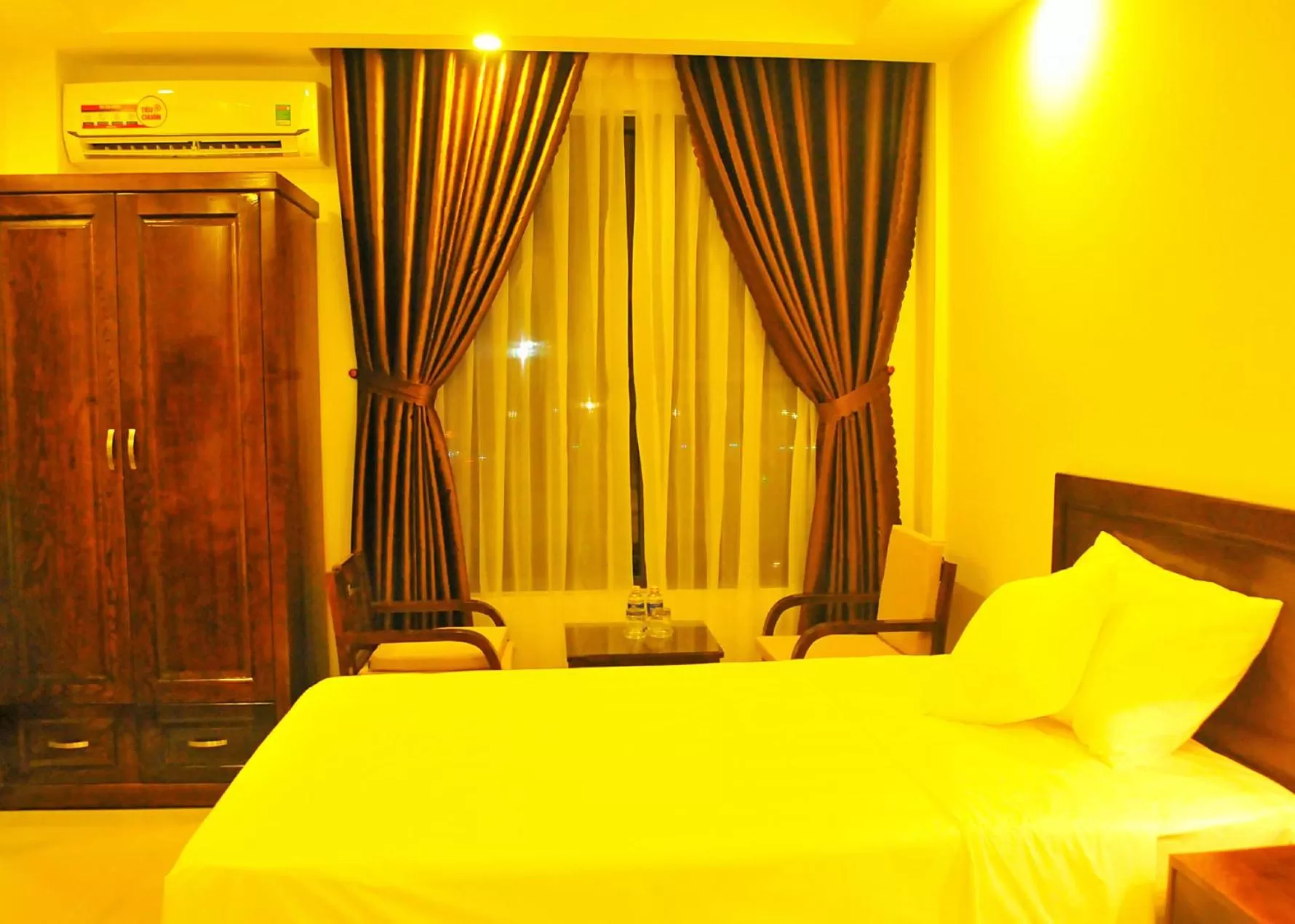Bed in Aries Hotel