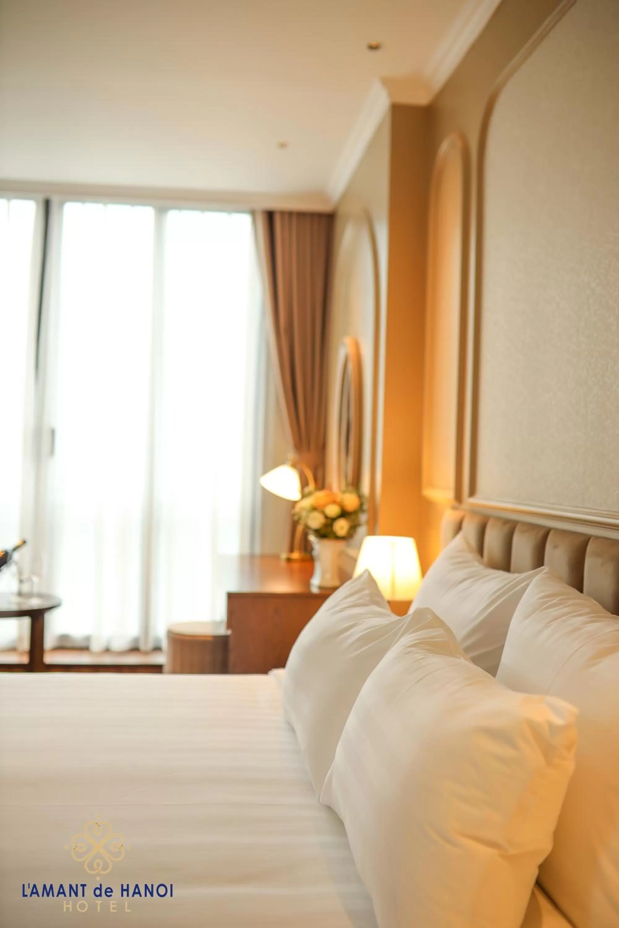 Bed in L'amant de Hanoi Hotel - khách sạn Lamant de Hà Nội