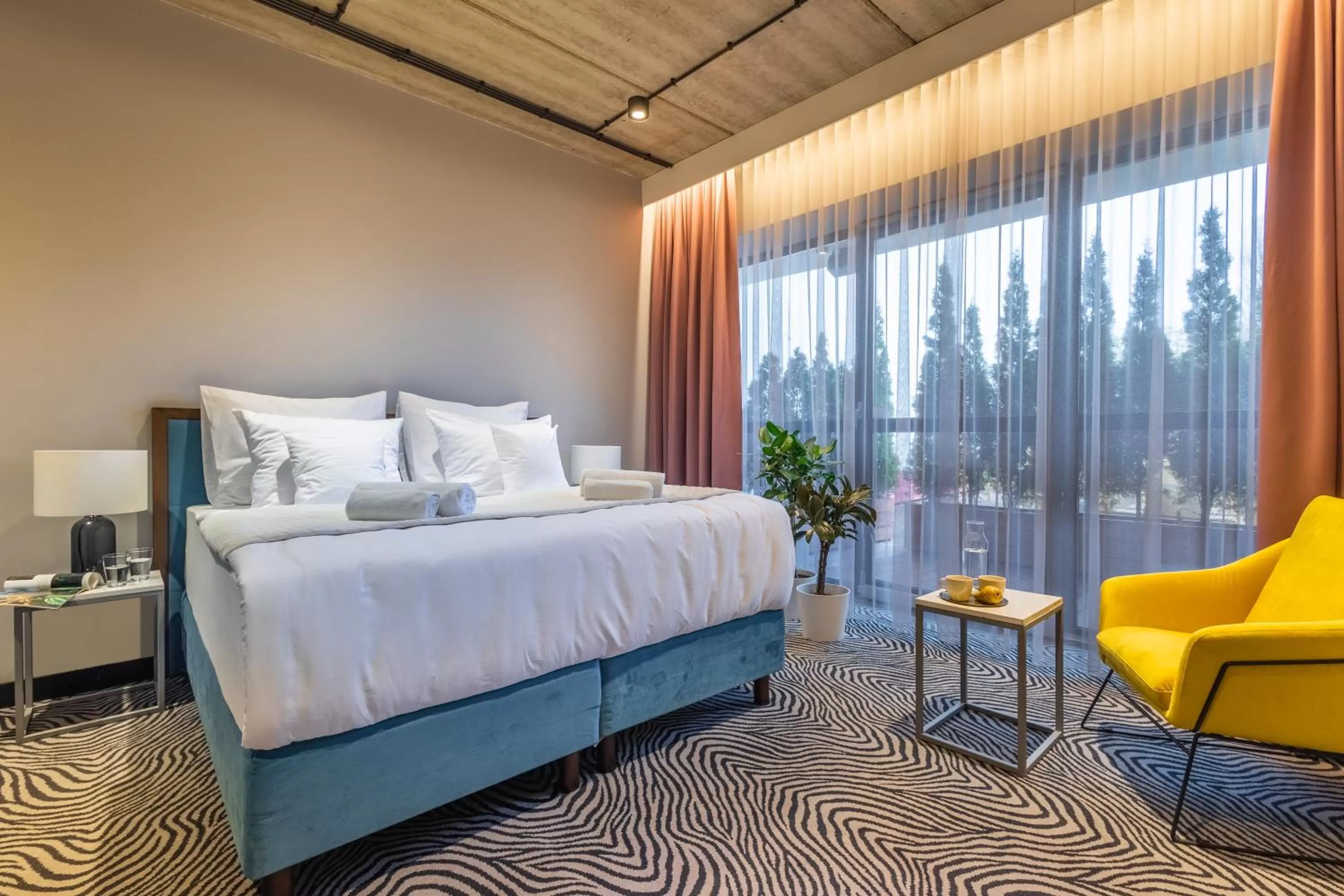 Bed in Hotel Zoo by Afrykarium Wroclaw