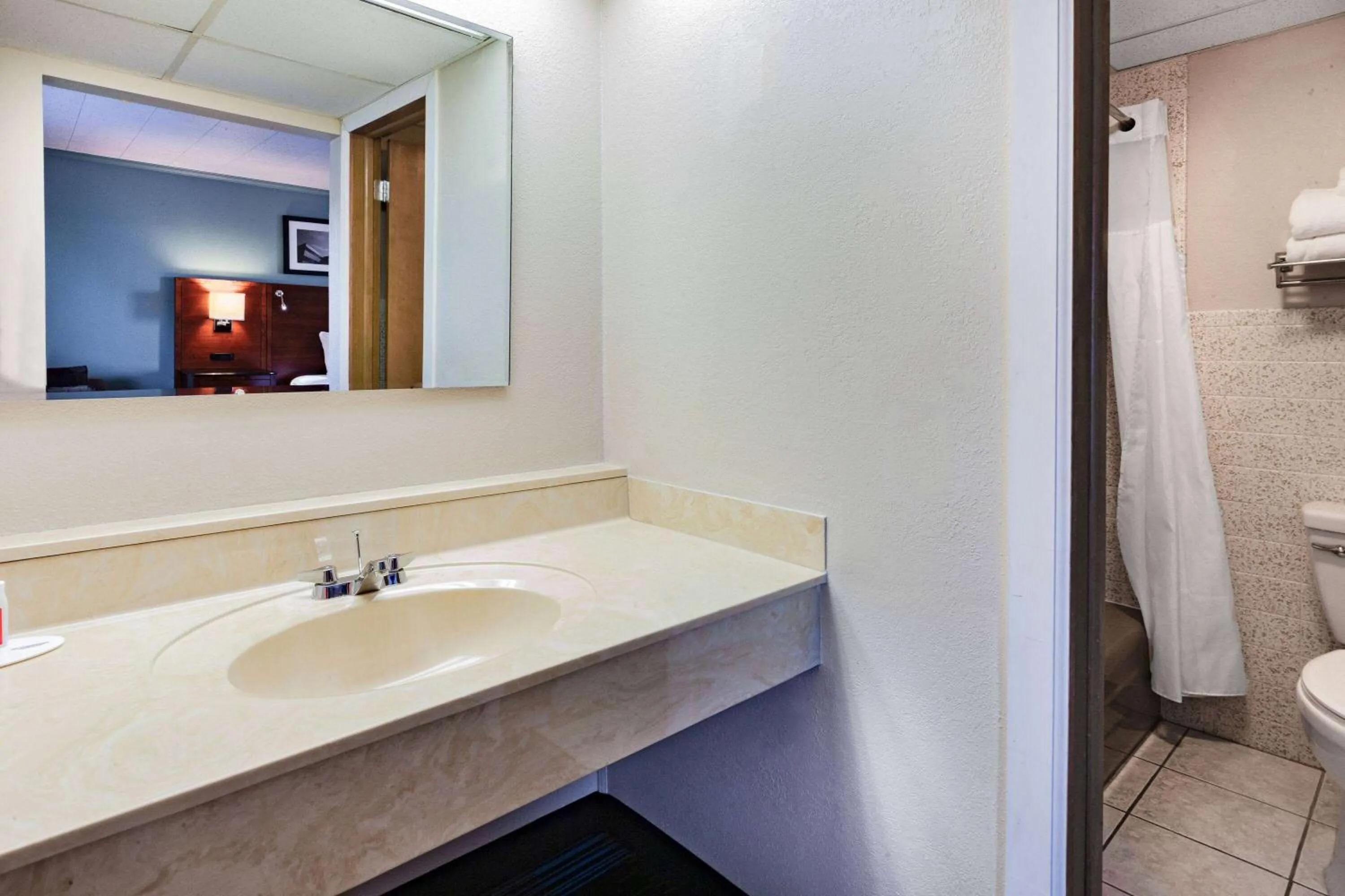 Bathroom in Days Inn & Suites by Wyndham St. Ignace Lakefront