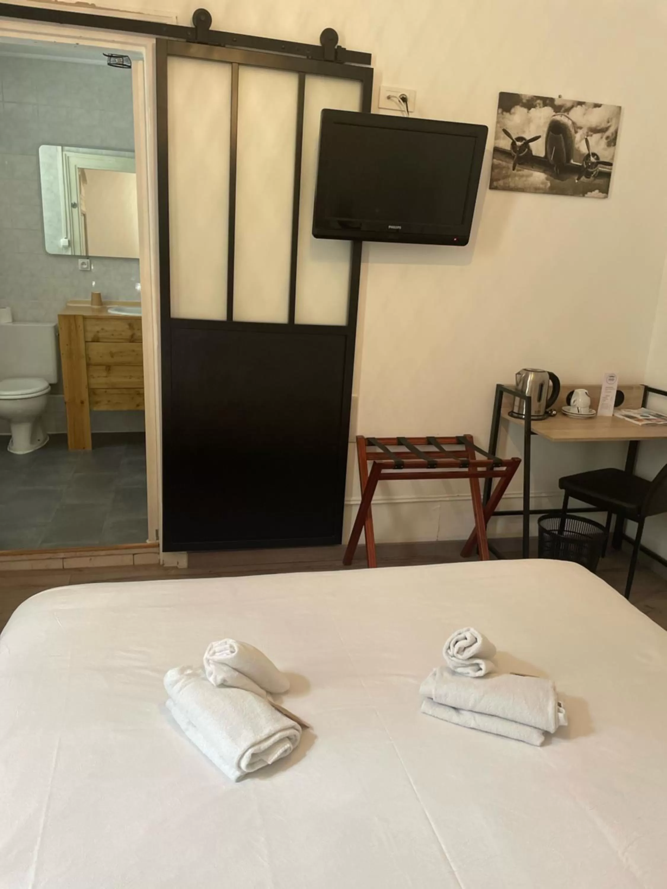 Bedroom, Bed in Hôtel & Restaurant Le Patio VICHY