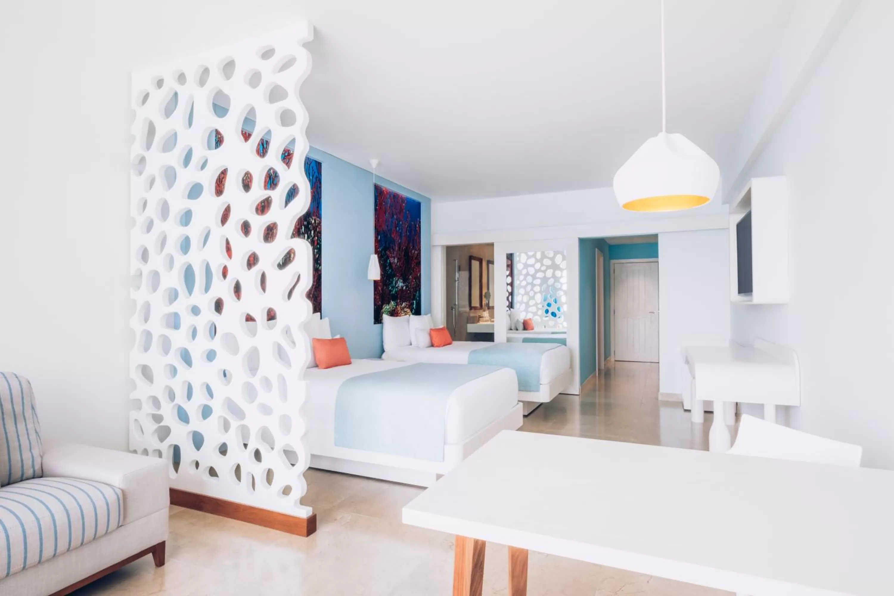 Living room, Bed in Coral Level at Iberostar Selection Cancun