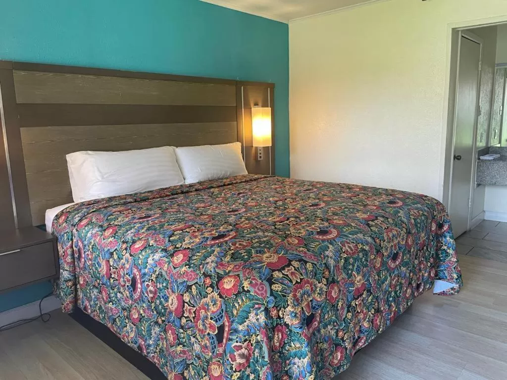 Bed in Executive Inn & Suites