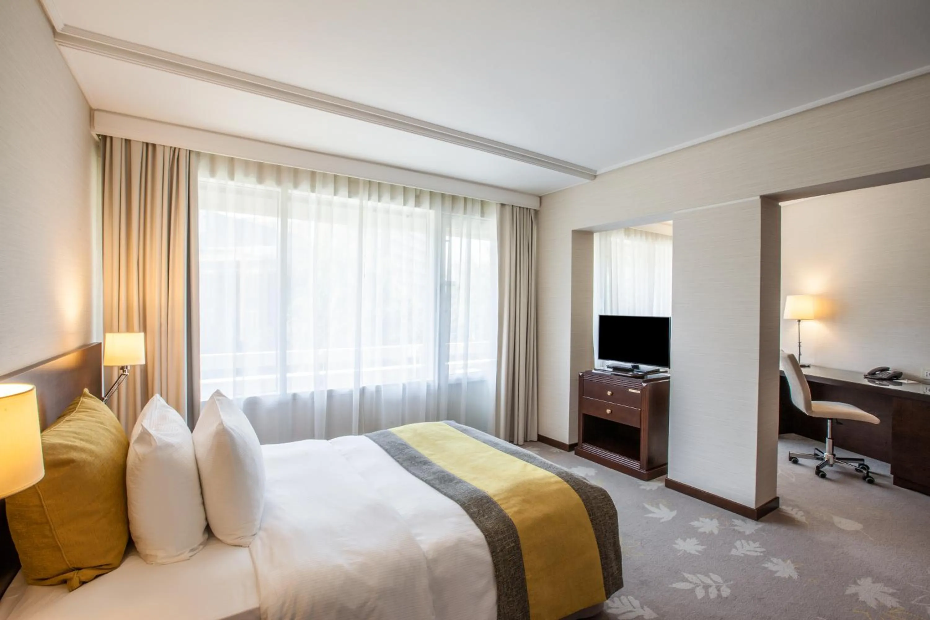 Bed in Crowne Plaza Bucharest by IHG