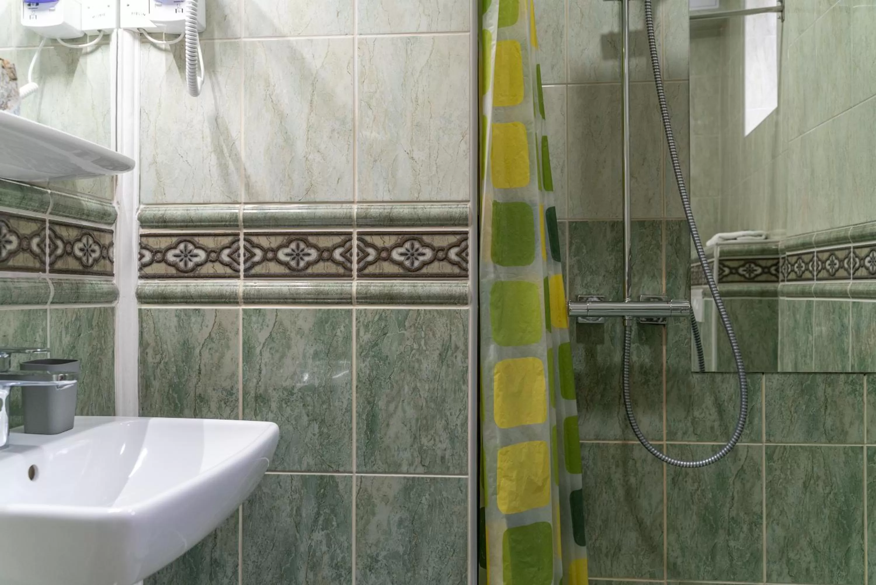 Shower in Ornament Hotel