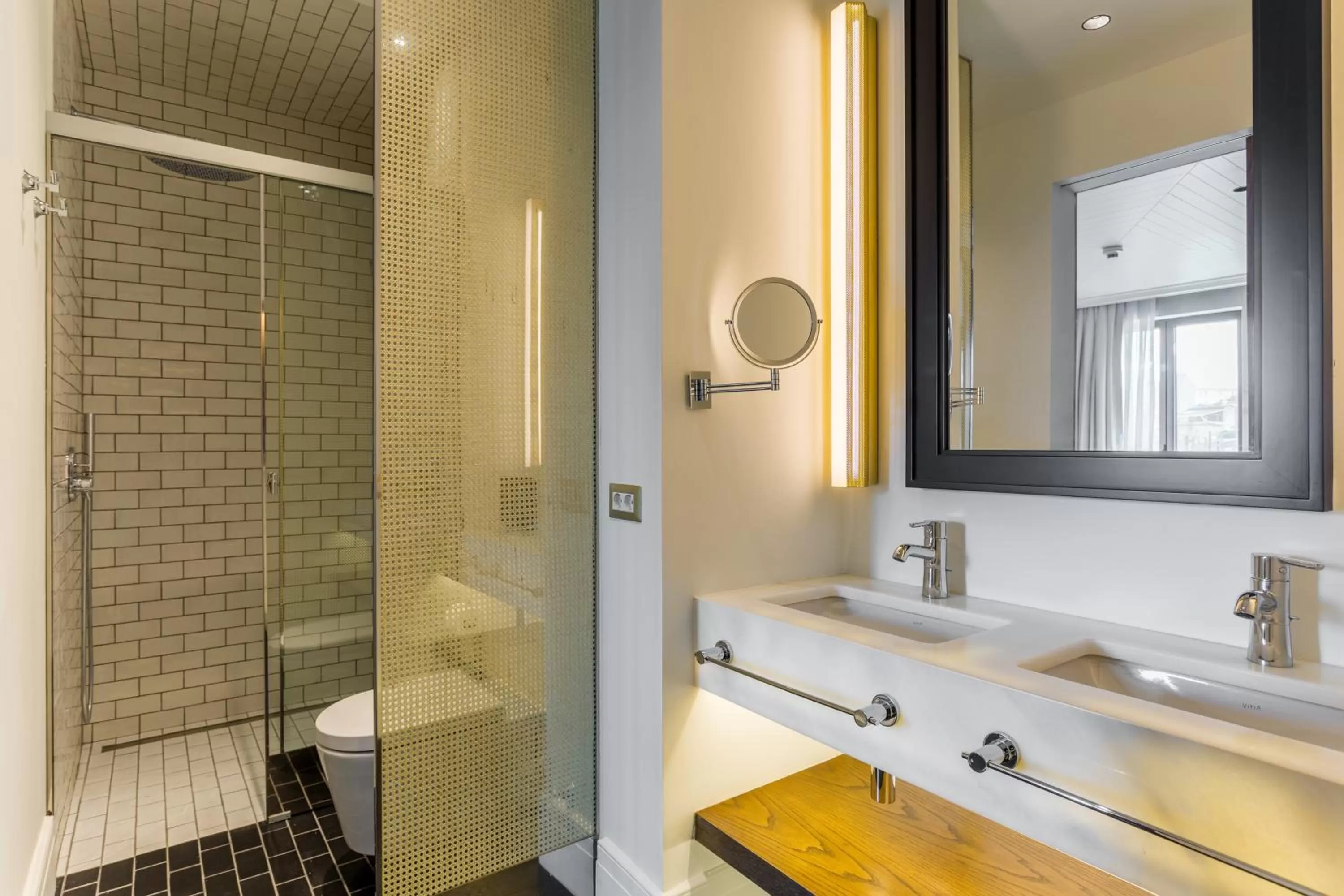 Shower in The Wings Hotels Collection