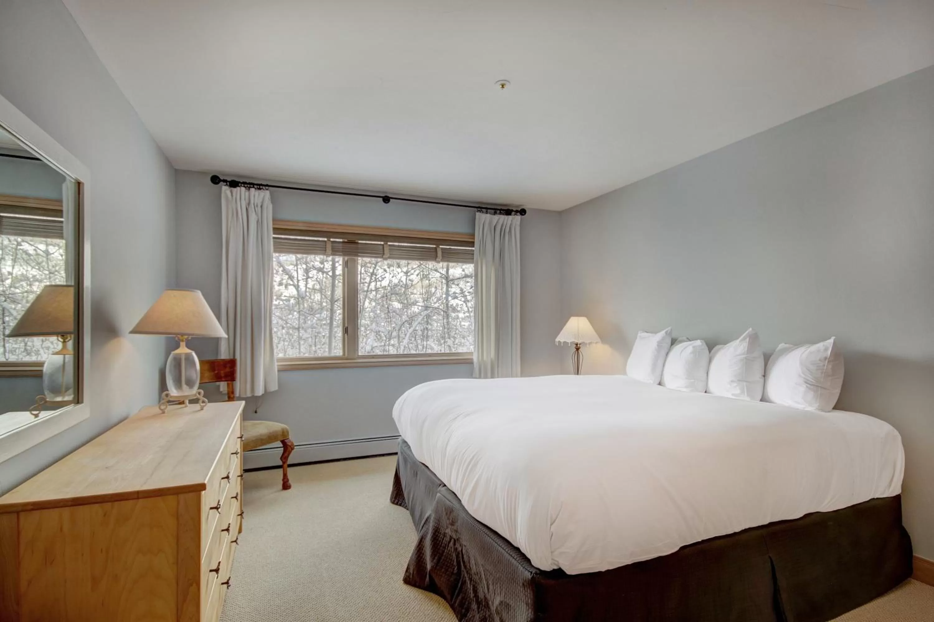 Bed in The Pines Lodge, a RockResort, by Vail Resorts