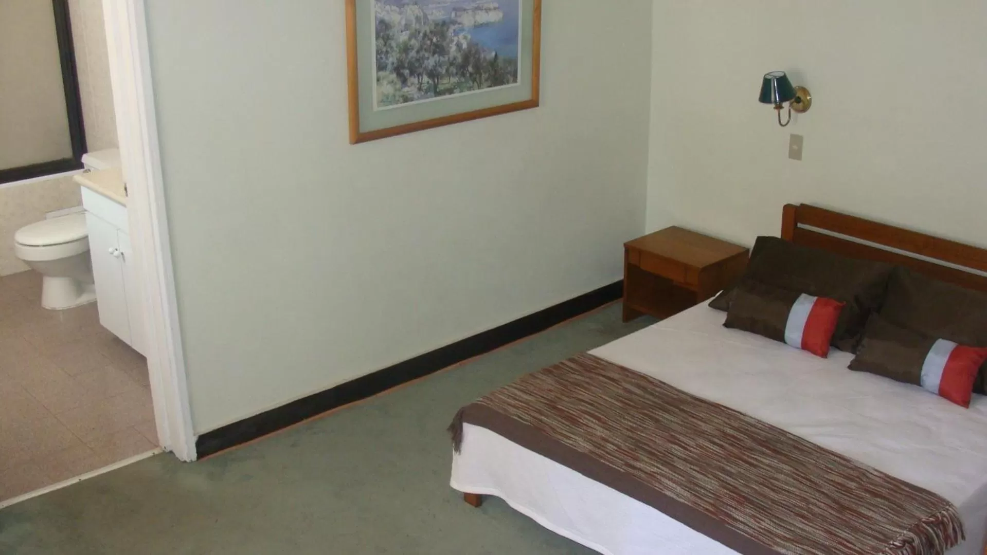 Bed in Hotel Chalet Suizo