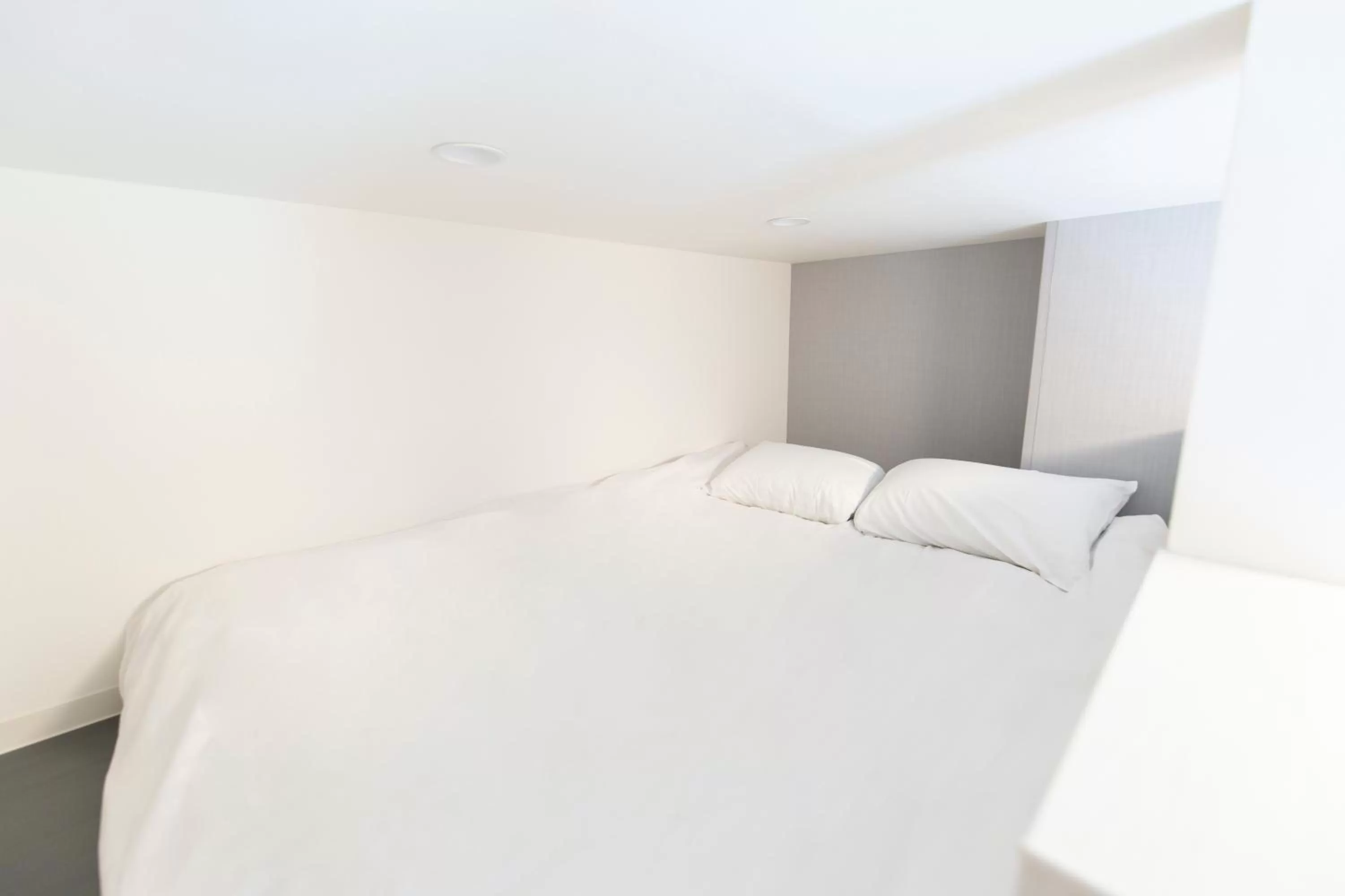 On site, Bed in GLOU Higashi Shinjuku