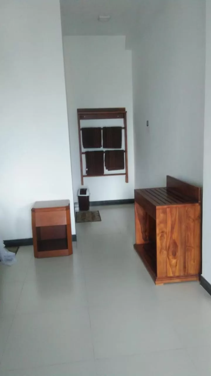 TV/Entertainment Center in Maple Home Stay