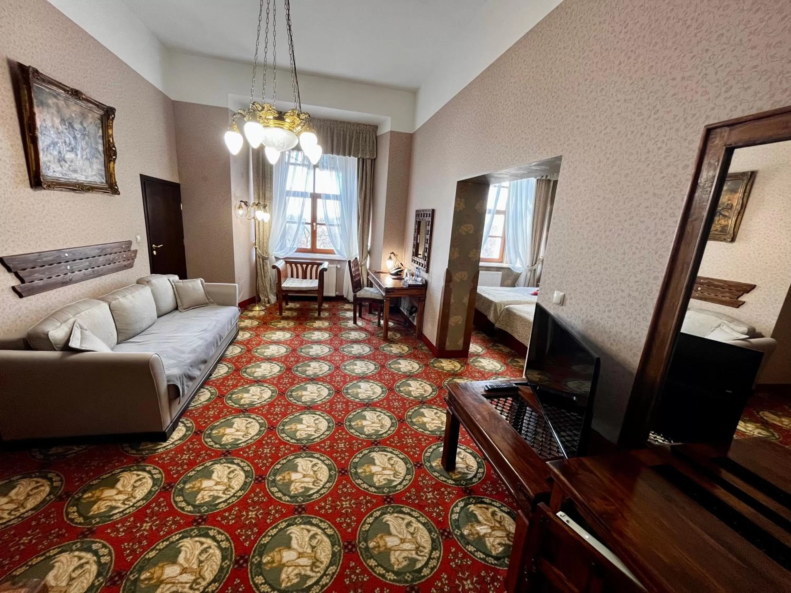 Seating area, Bed in Hotel Zamek Ryn